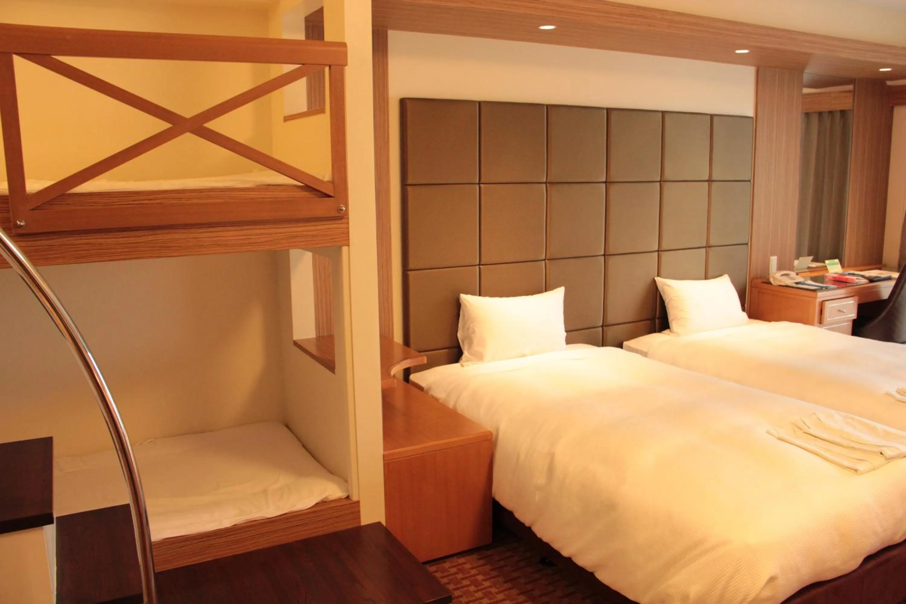 Bed in Okinawa Kariyushi Beach Resort Ocean Spa