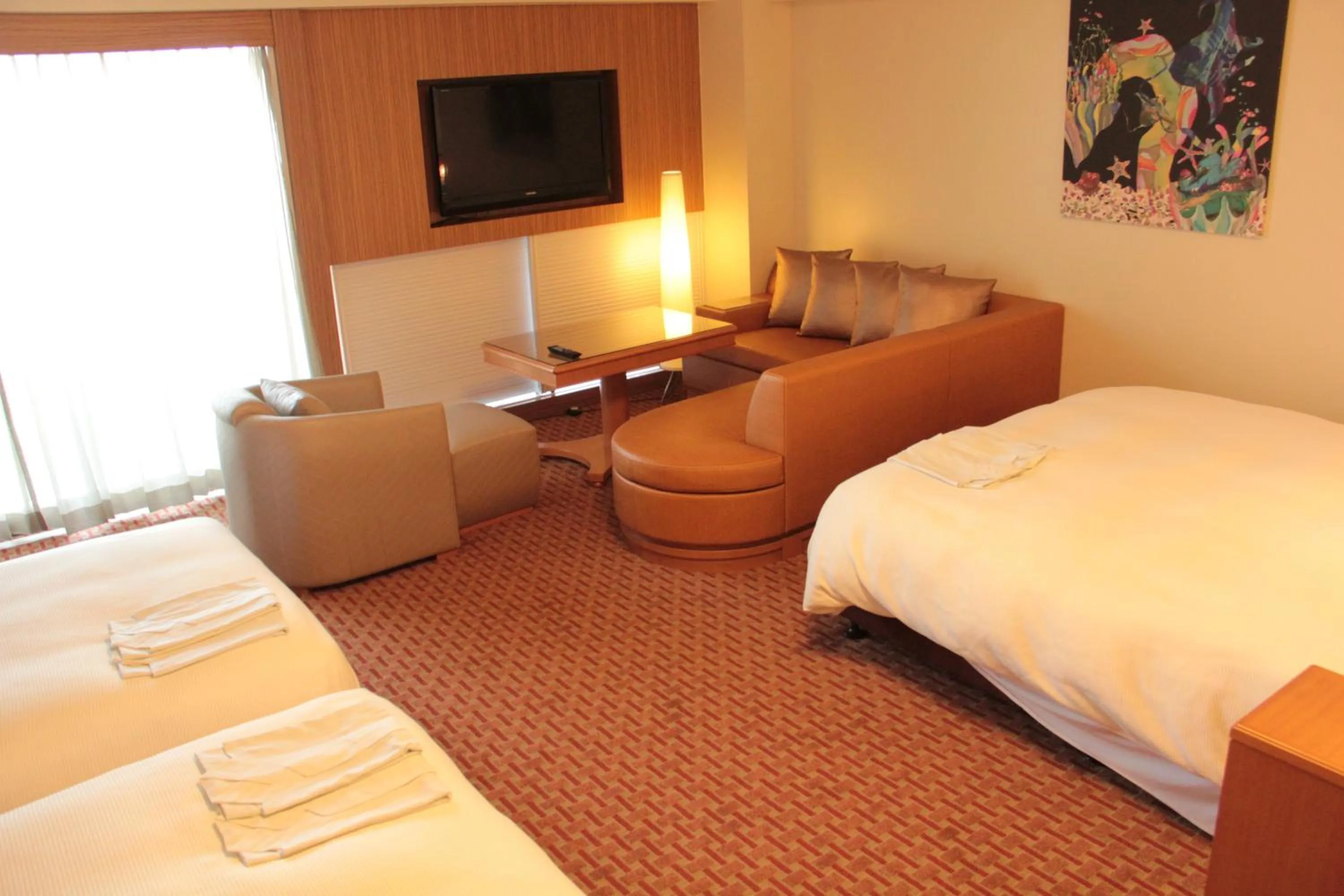 Bed in Okinawa Kariyushi Beach Resort Ocean Spa