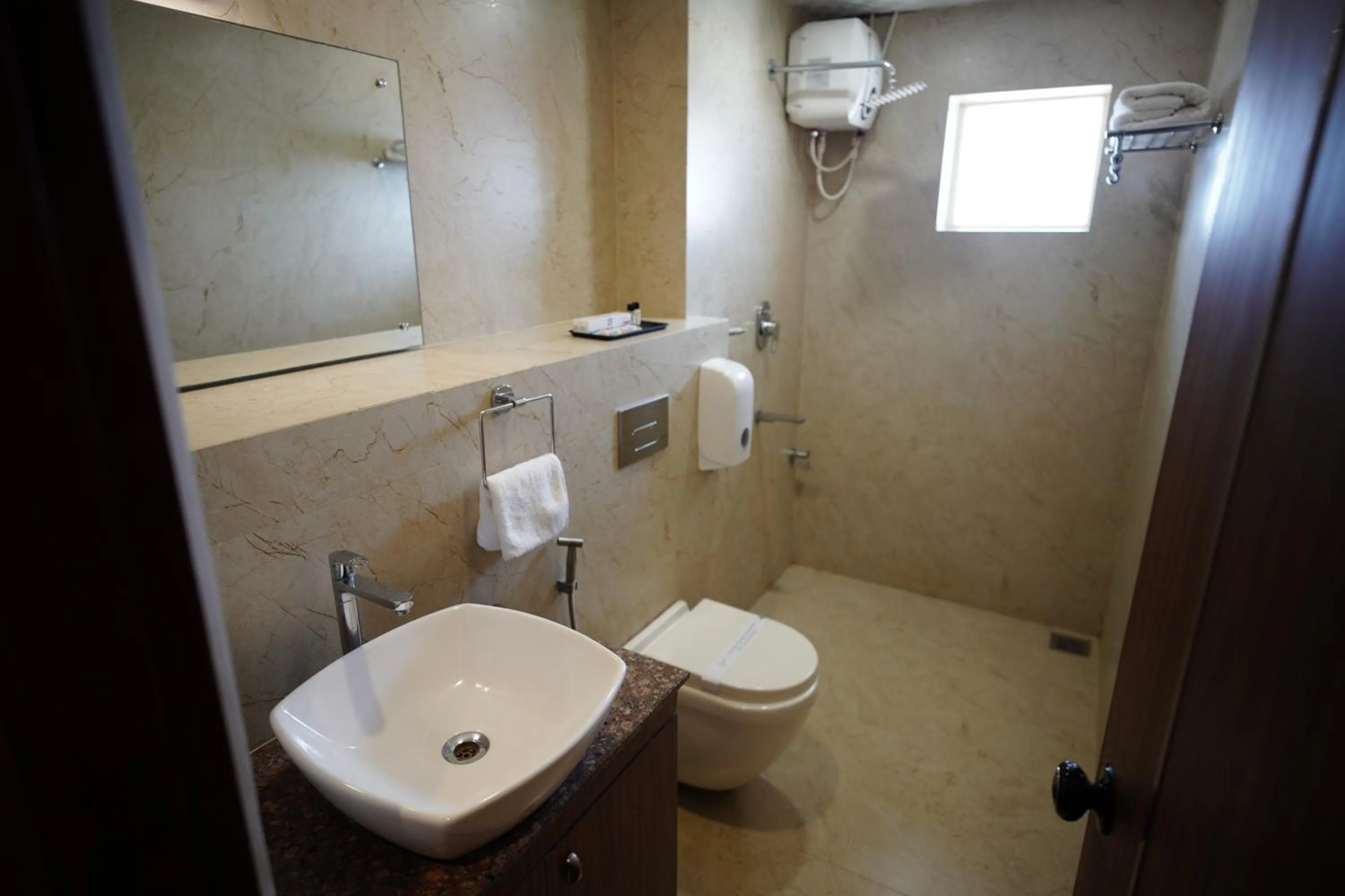 Shower in Four N Square Residency