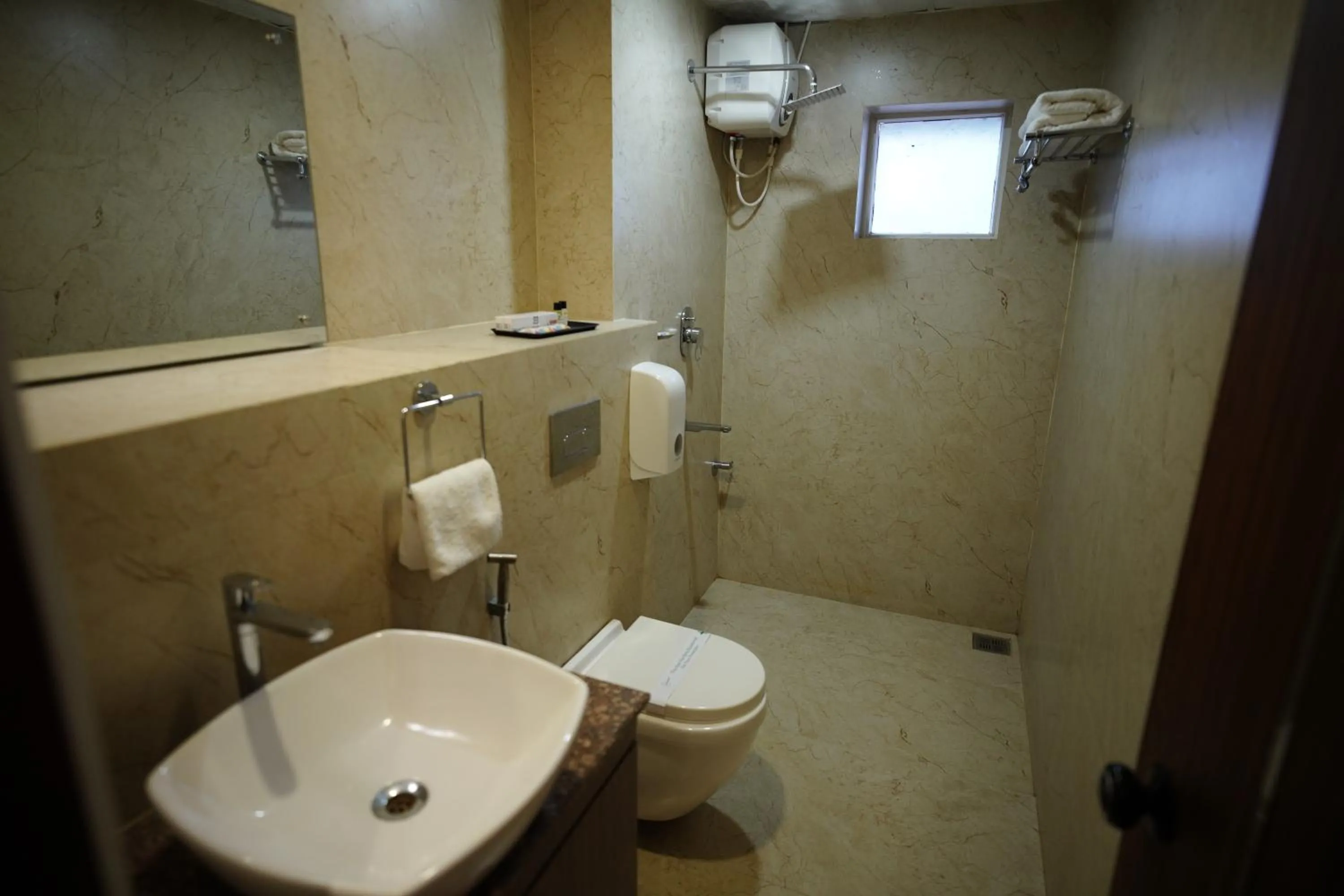 Shower in Four N Square Residency
