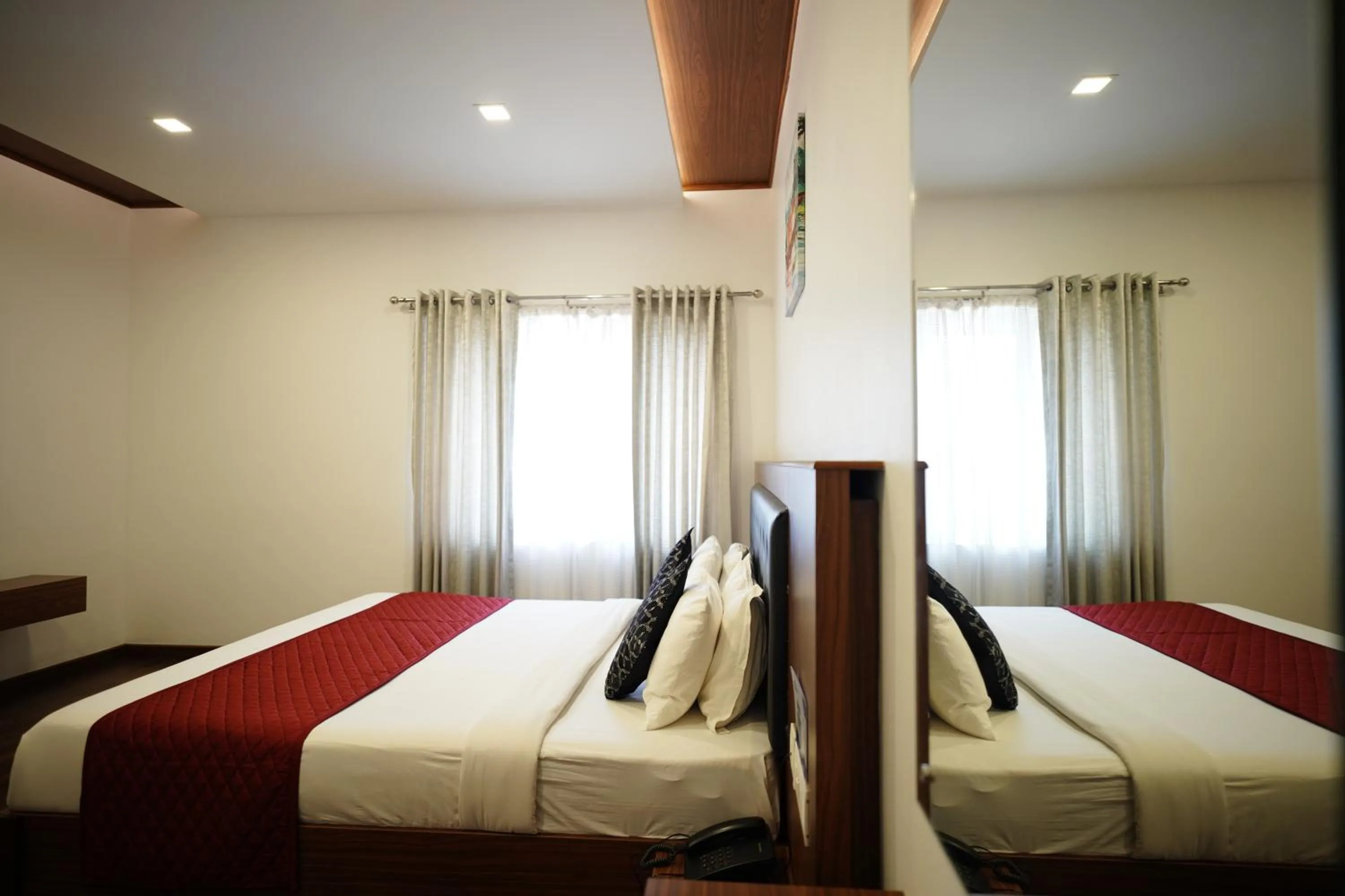 Photo of the whole room, Bed in Four N Square Residency