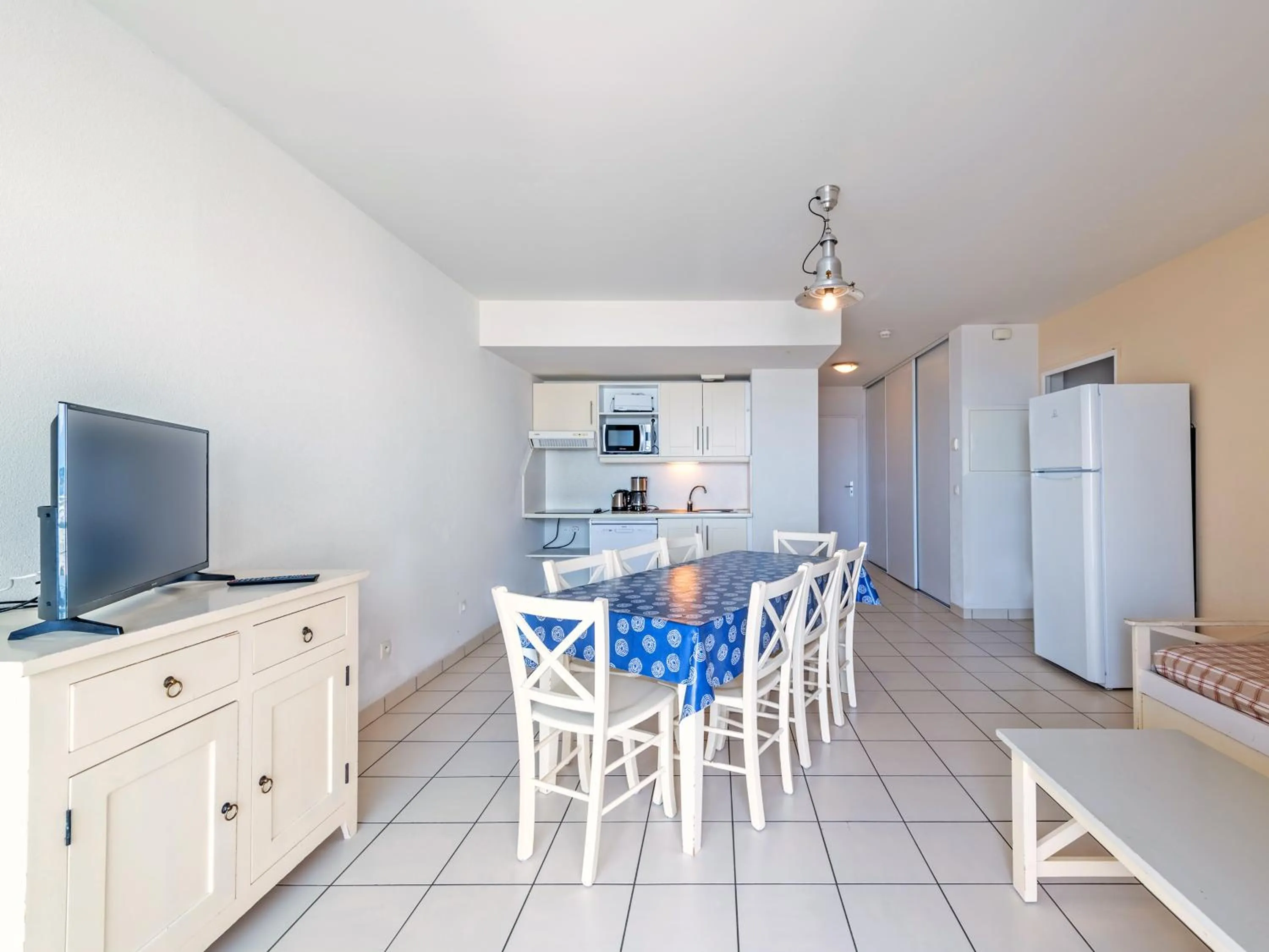 Dining area in Vacancéole - Le Domaine de Bertheaume