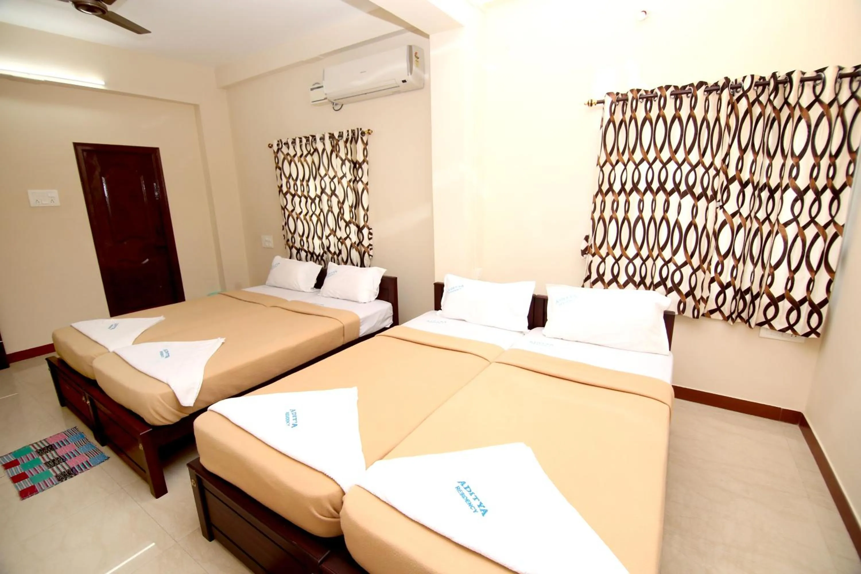 Photo of the whole room, Bed in Aditya Residency