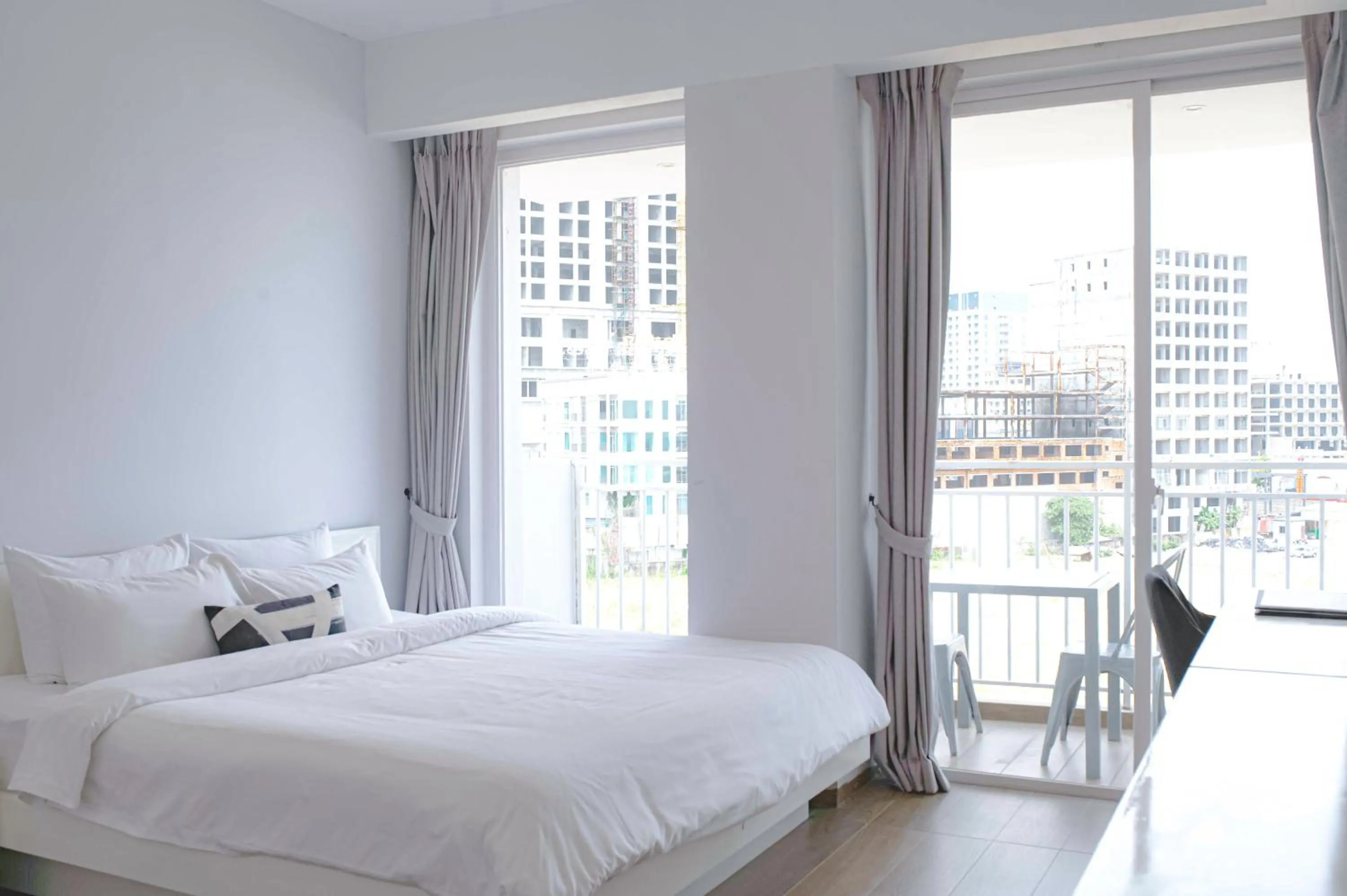 Bed in La Vogue Boutique Hotel & Casino