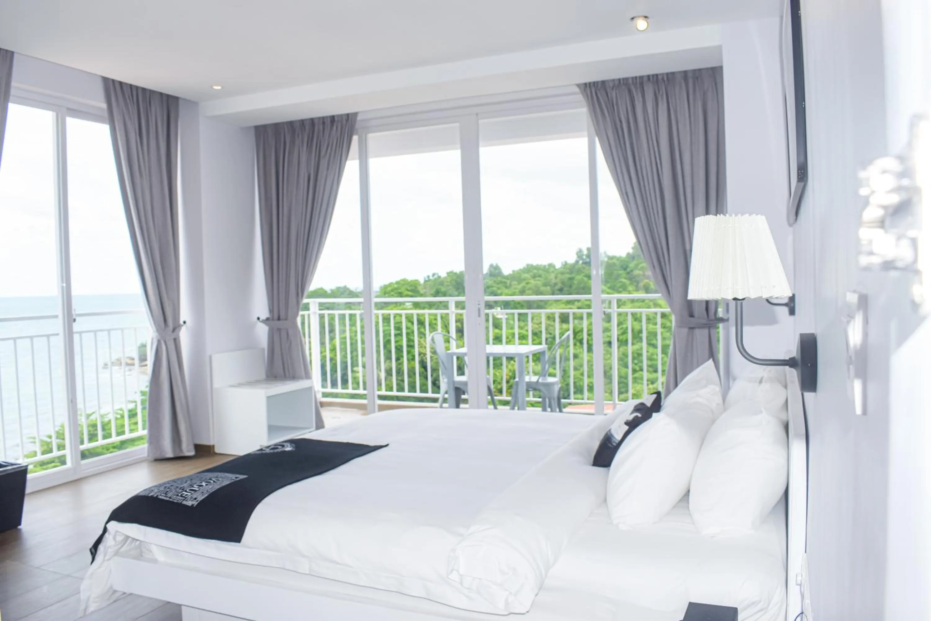 Bed in La Vogue Boutique Hotel & Casino