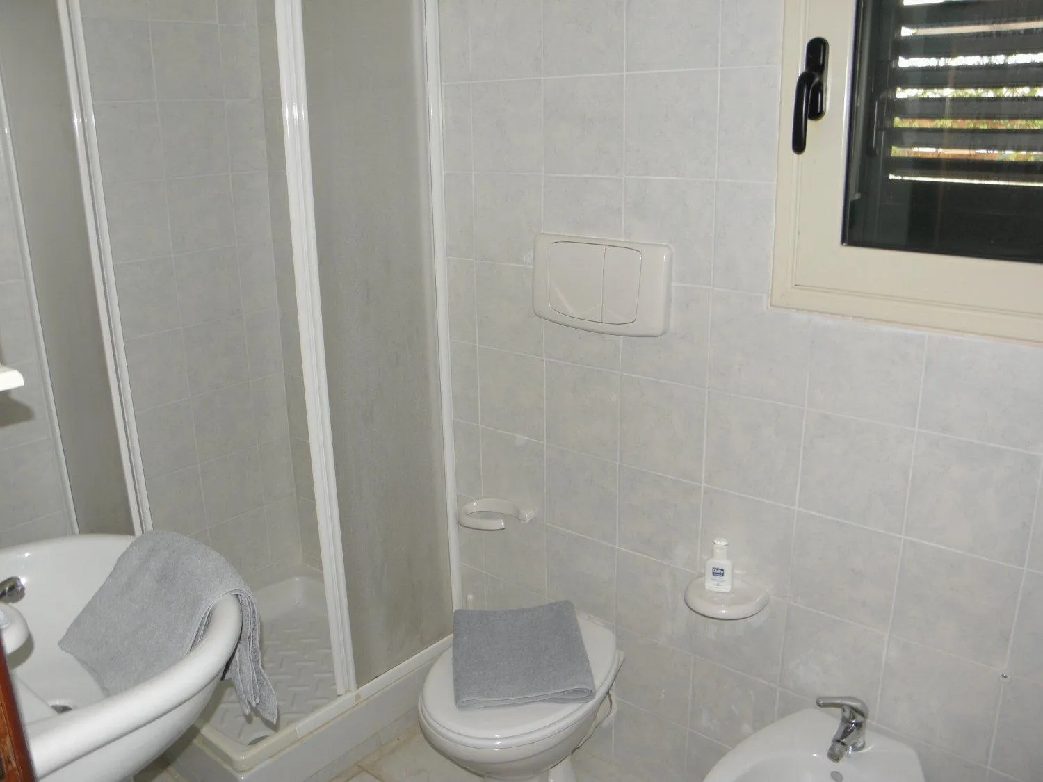 Bathroom in Residence Blue Sky - San Foca