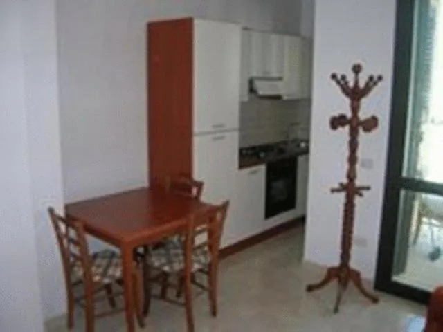 Kitchen or kitchenette in Residence Blue Sky - San Foca