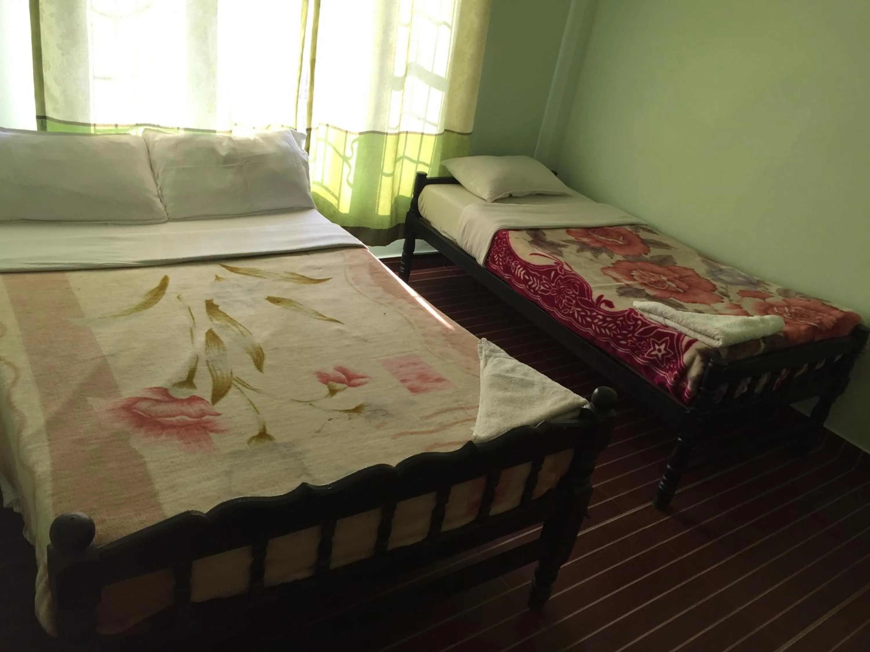 Bedroom, Bed in Harry Guest House & Restaurant