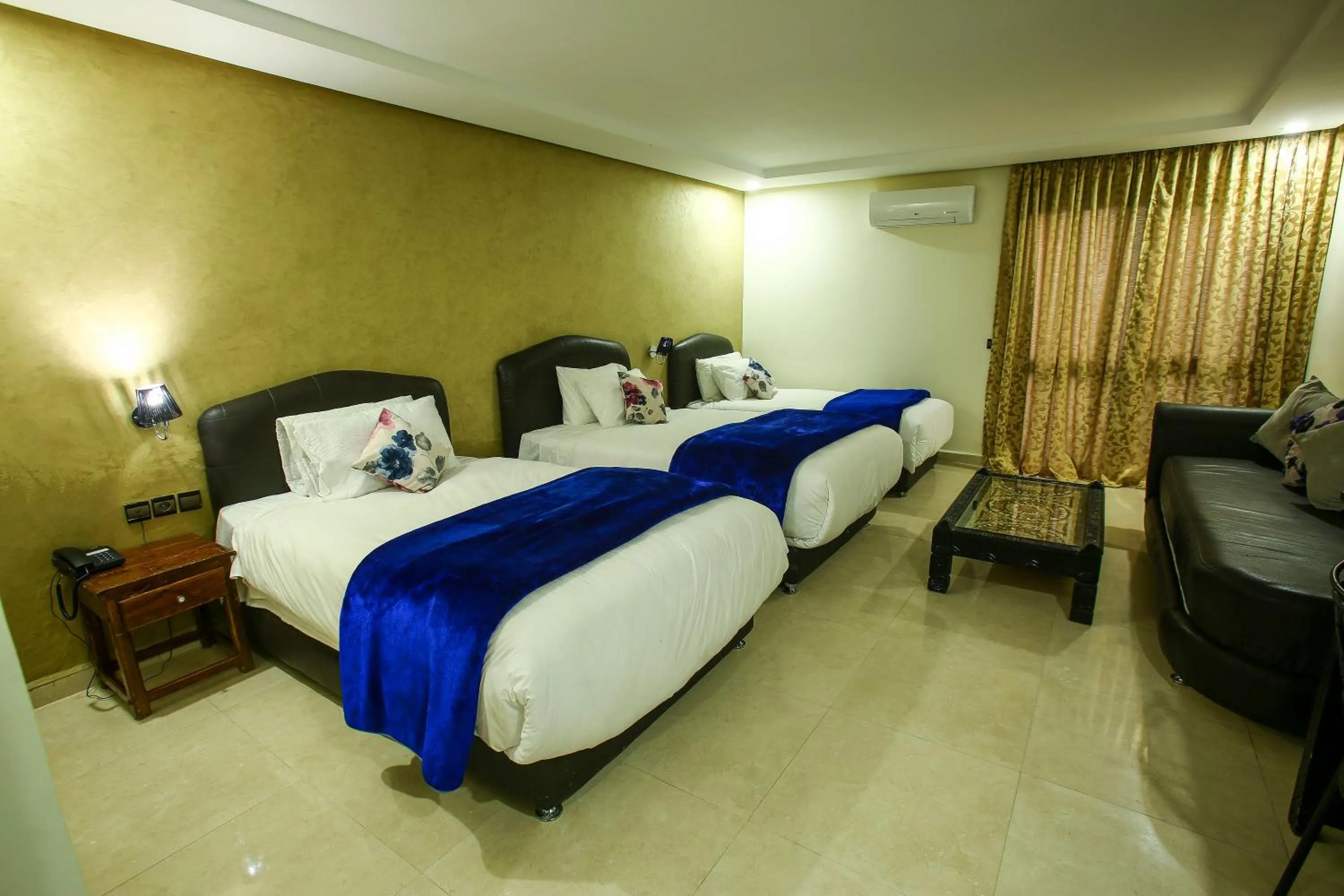 Bed in Palm's Hotel Club