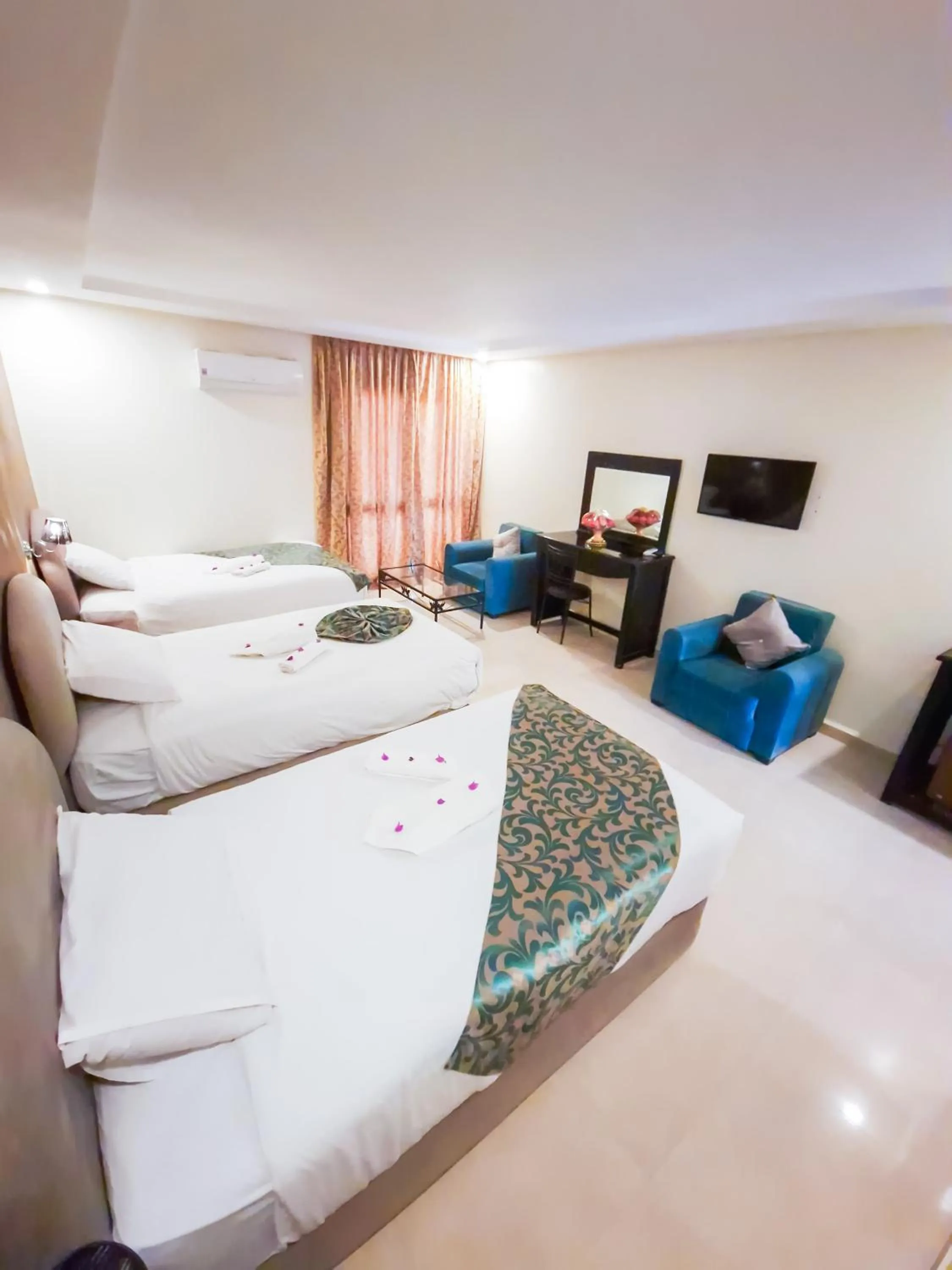 Bed in Palm's Hotel Club