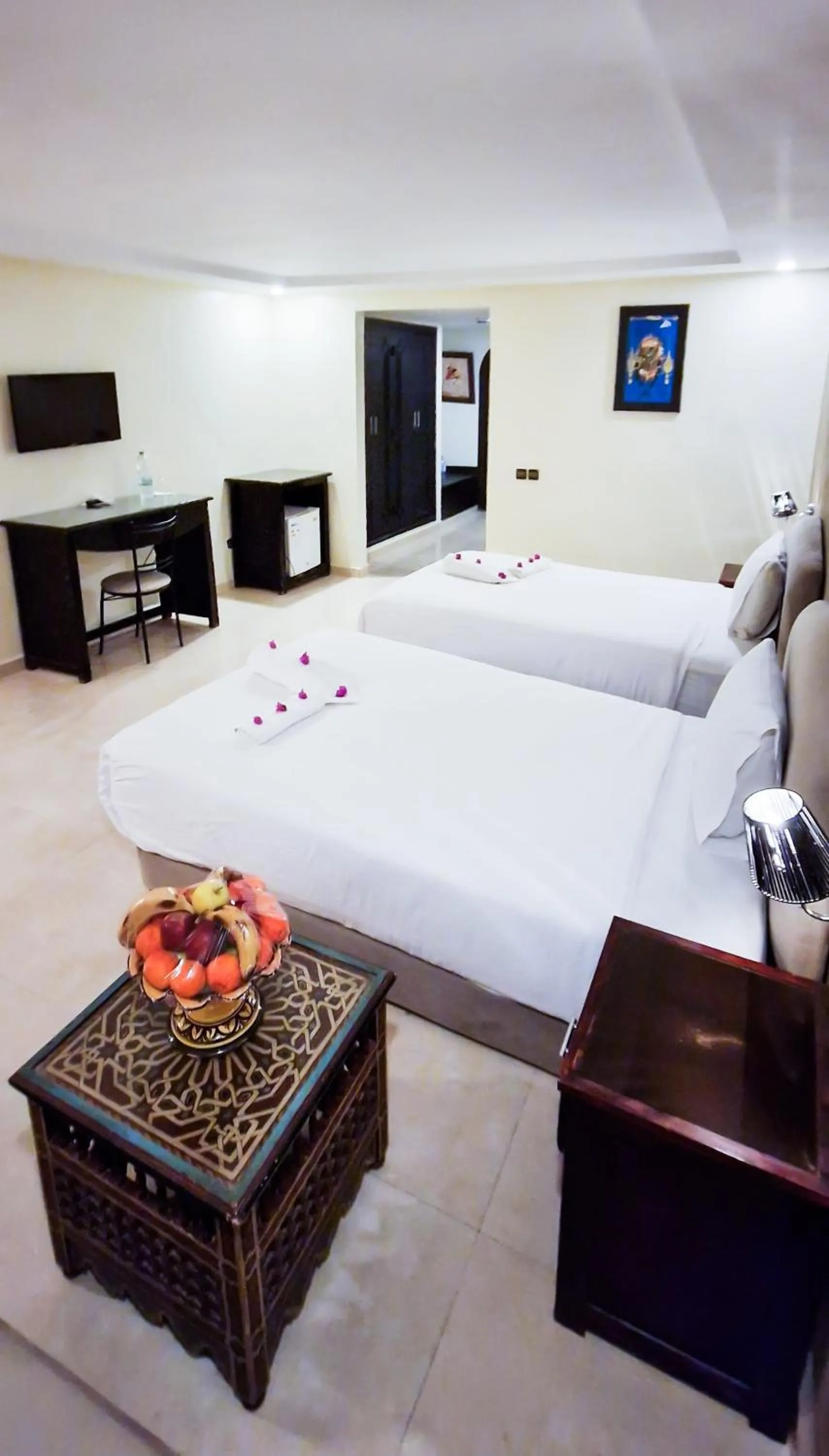 Bed in Palm's Hotel Club