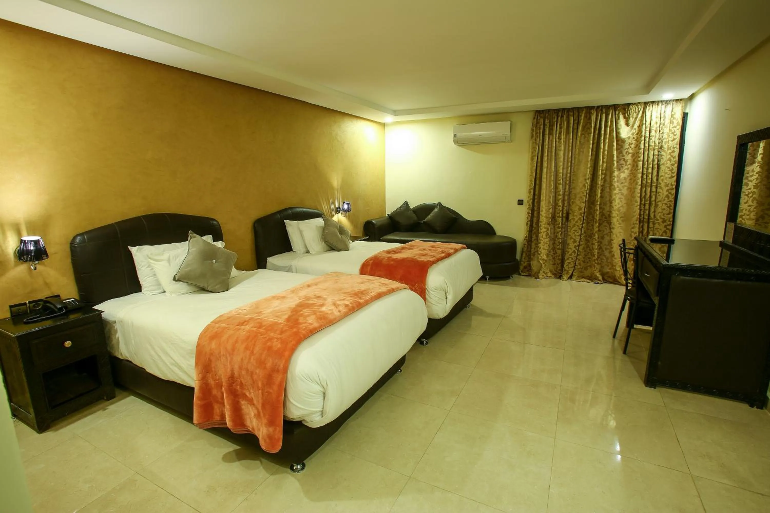 Bed in Palm's Hotel Club