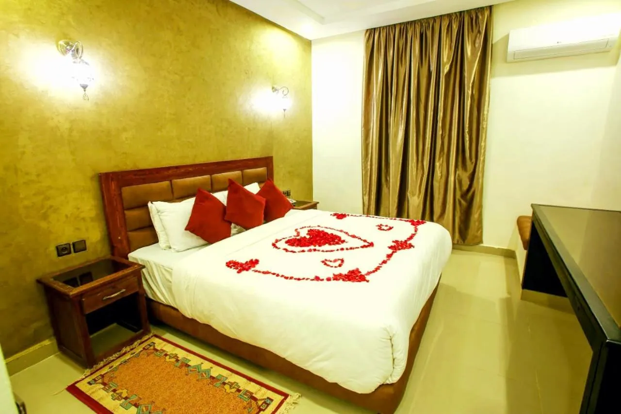 Bed in Palm's Hotel Club