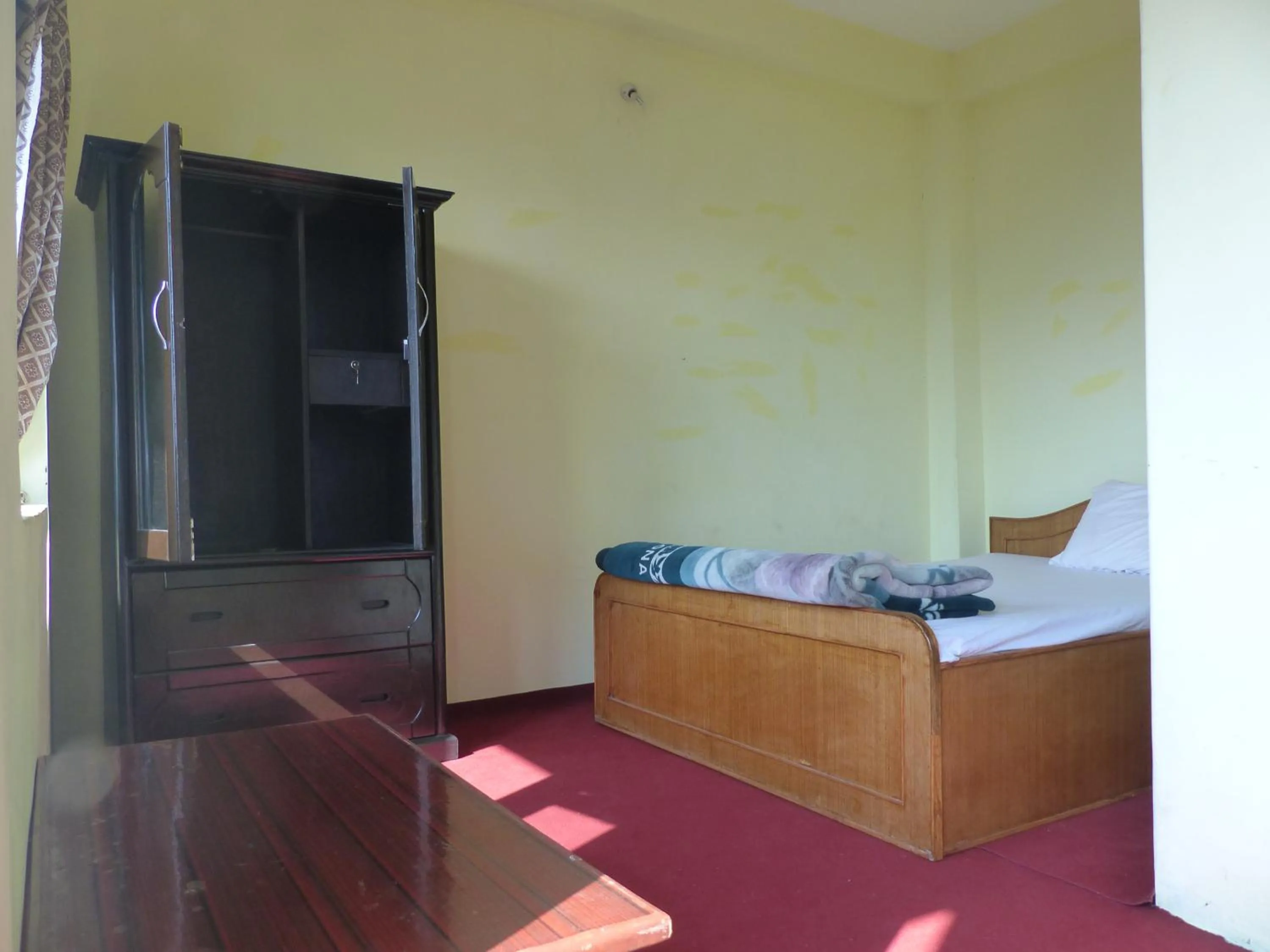 Bed in Gorgeous Village Guest House