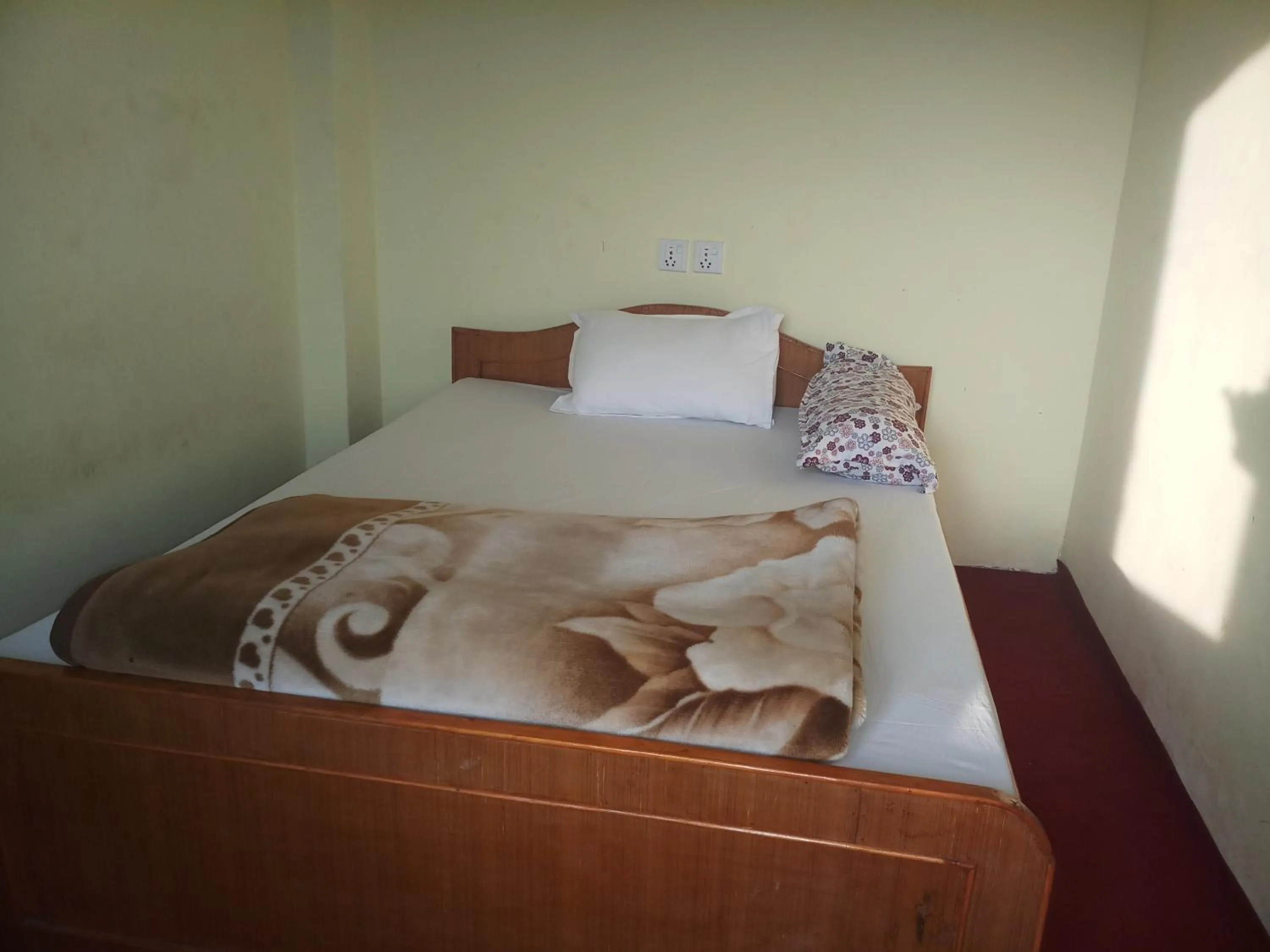 Bed in Gorgeous Village Guest House
