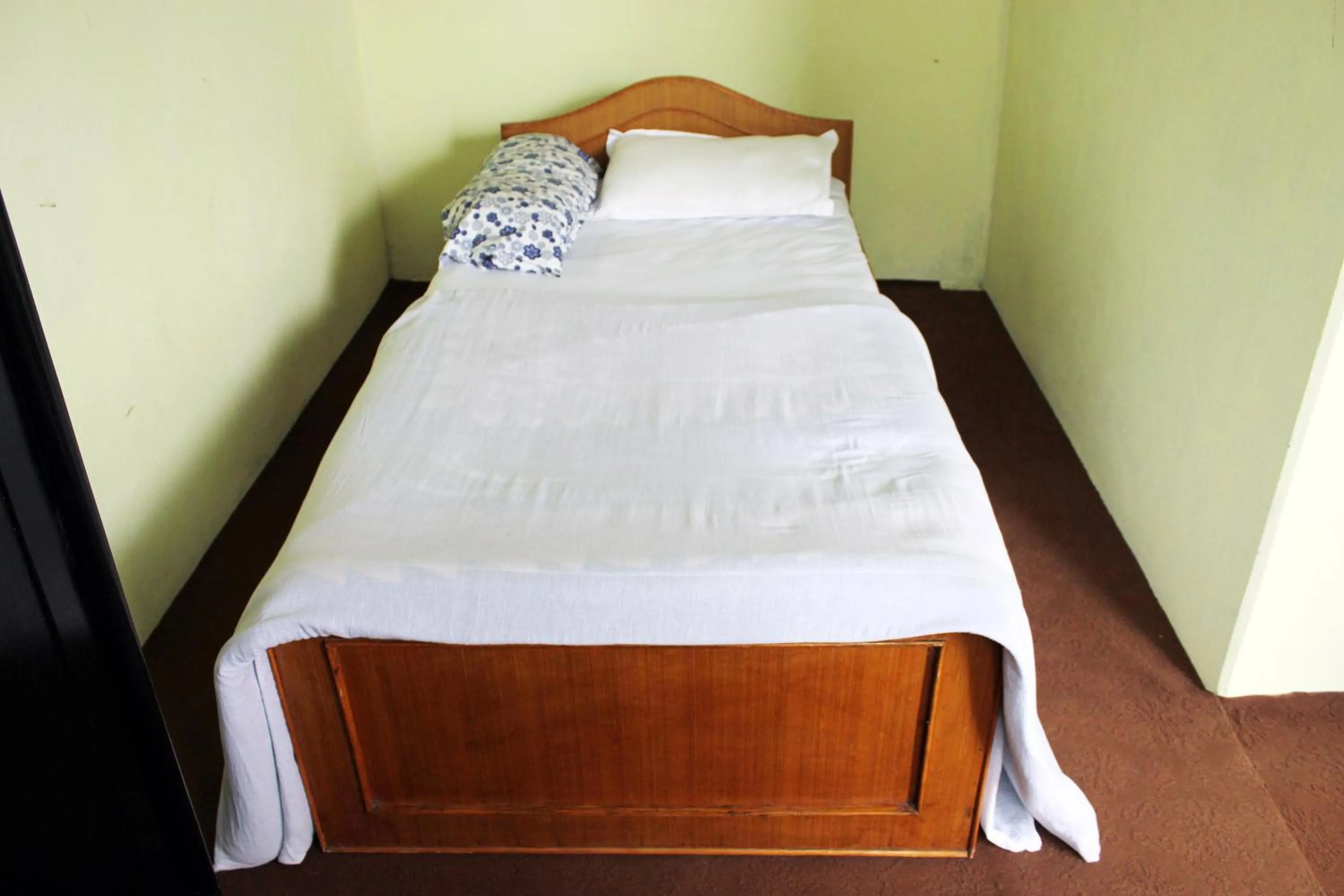 Bed in Gorgeous Village Guest House