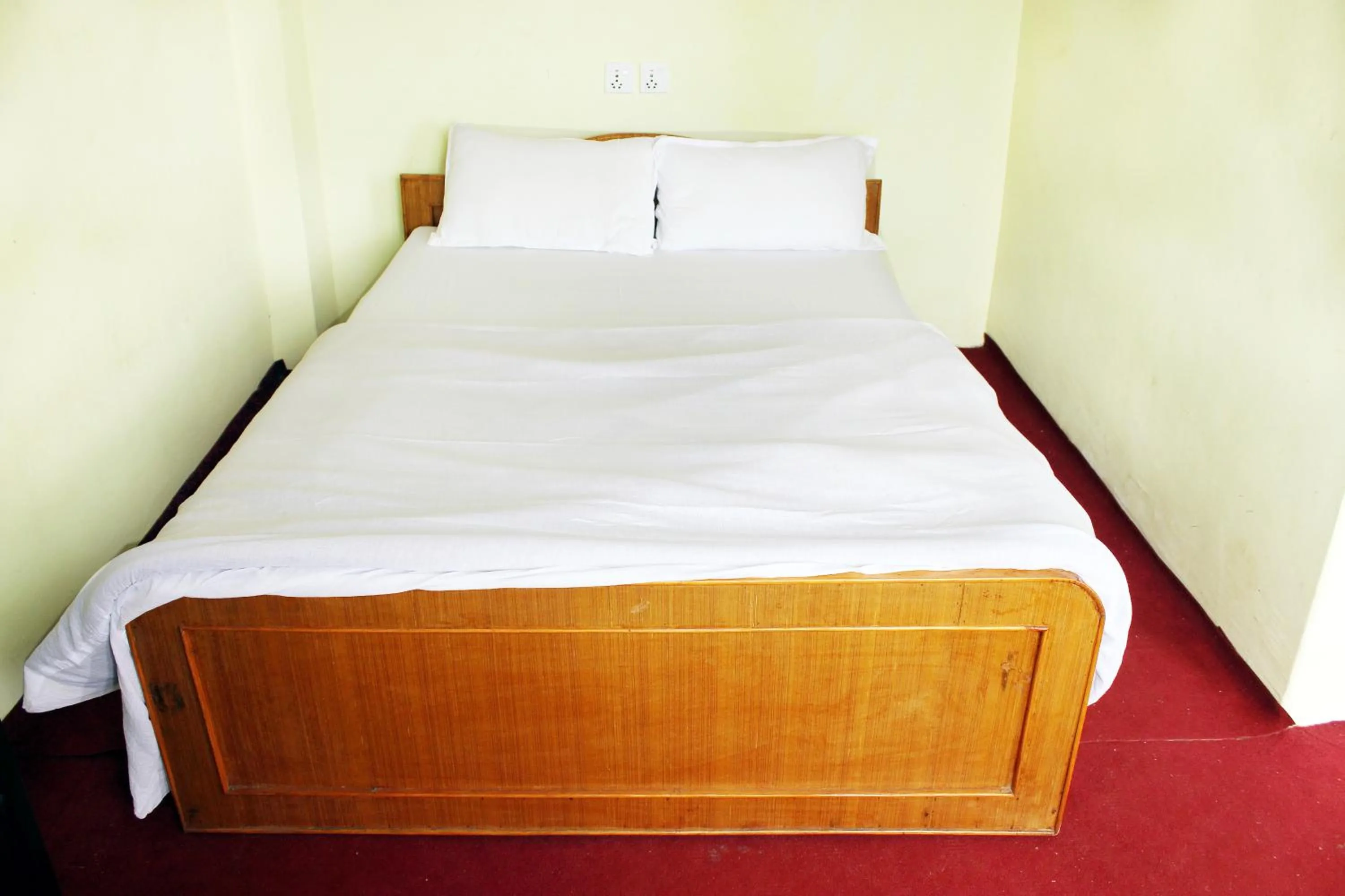 Bed in Gorgeous Village Guest House