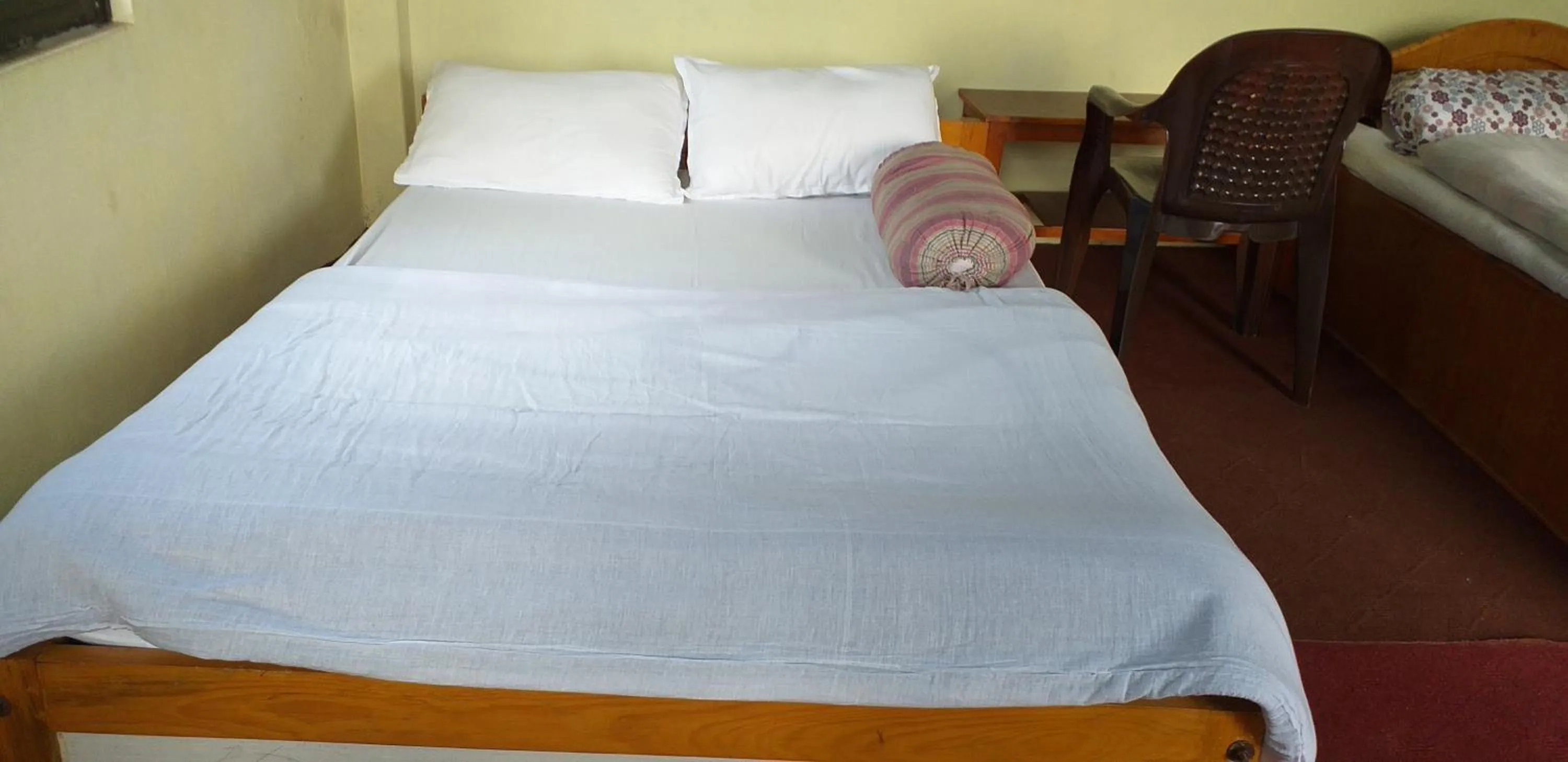 Bed in Gorgeous Village Guest House