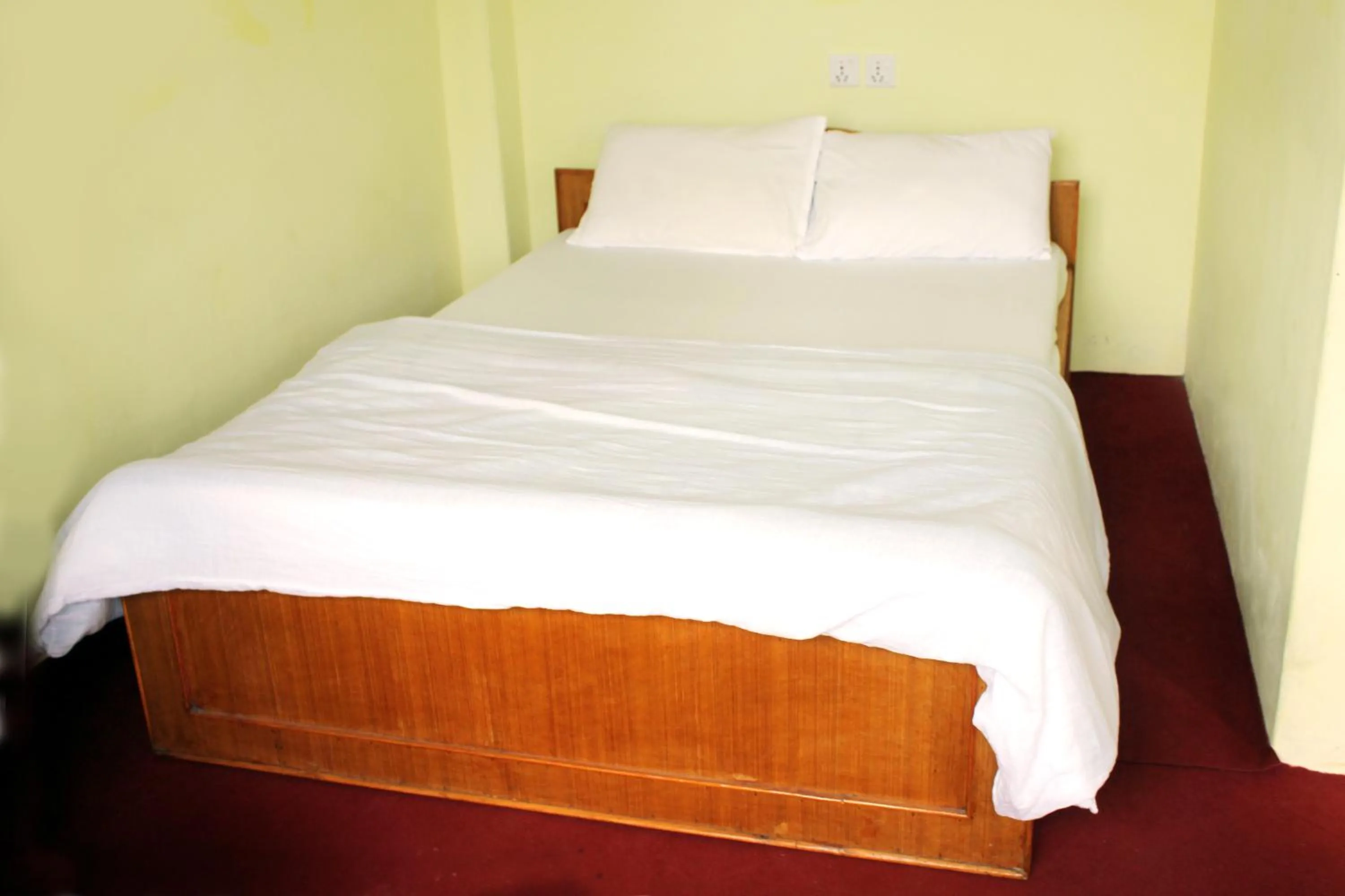 Bed in Gorgeous Village Guest House