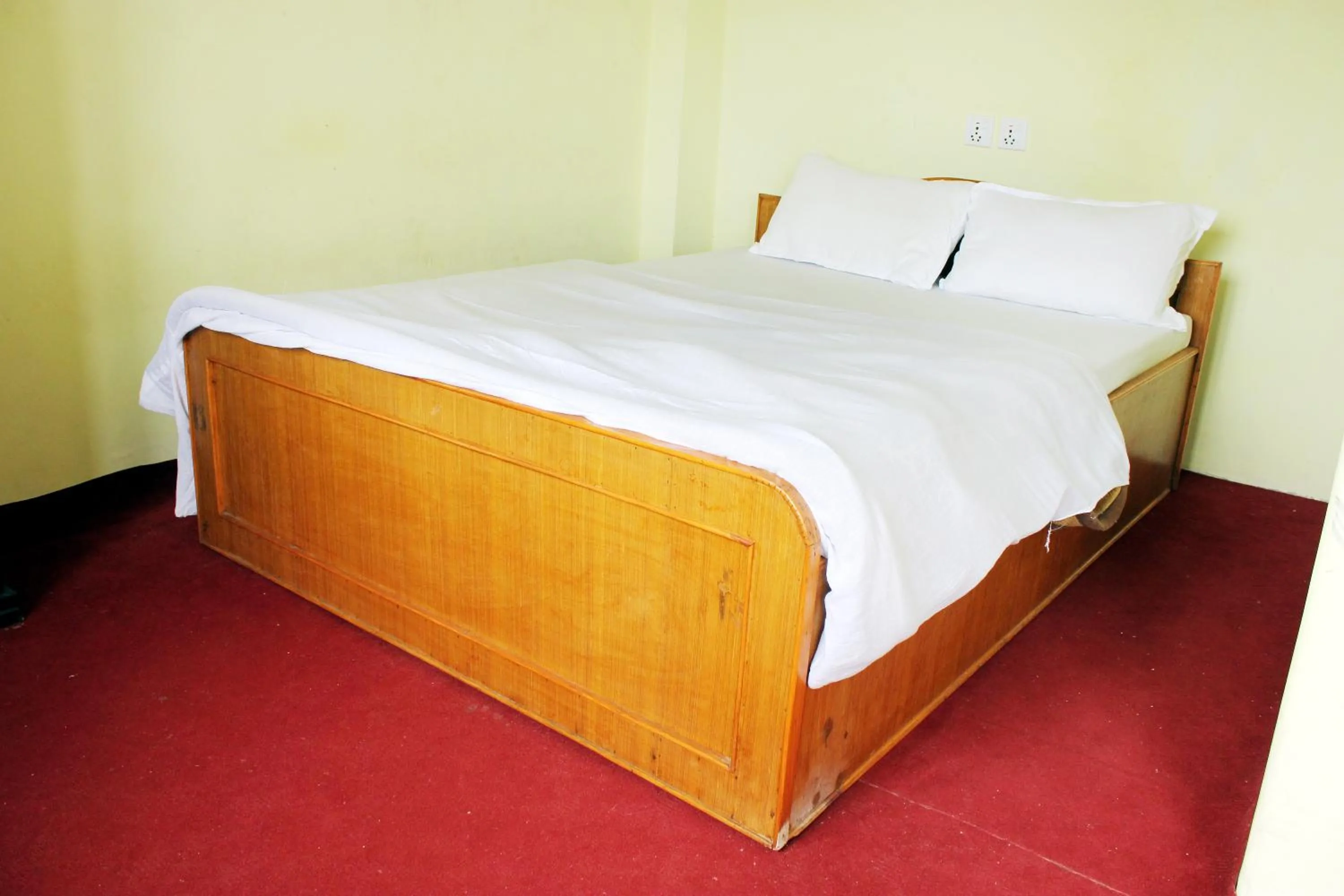 Bed in Gorgeous Village Guest House