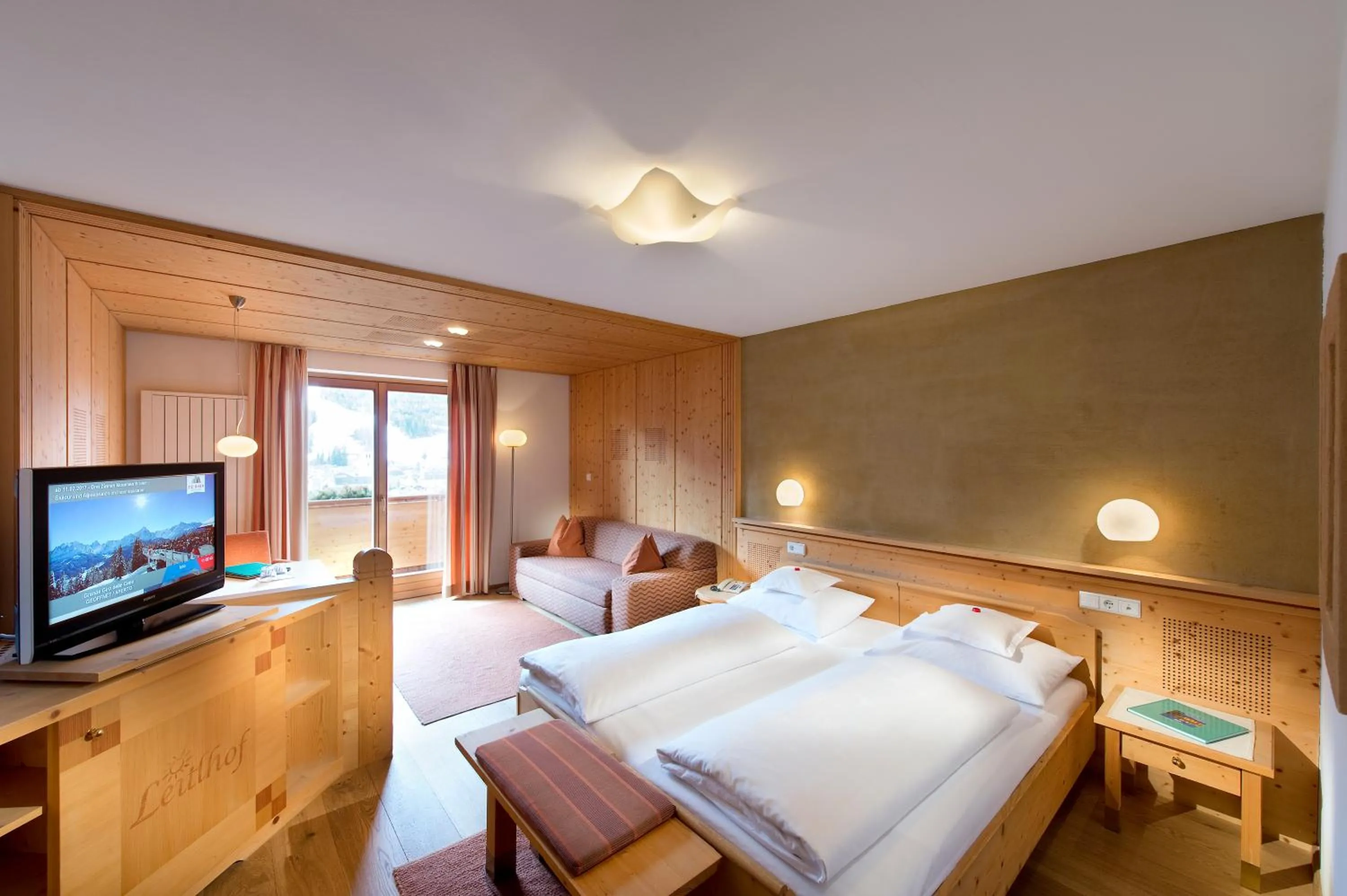 Photo of the whole room, Bed in Naturhotel Leitlhof