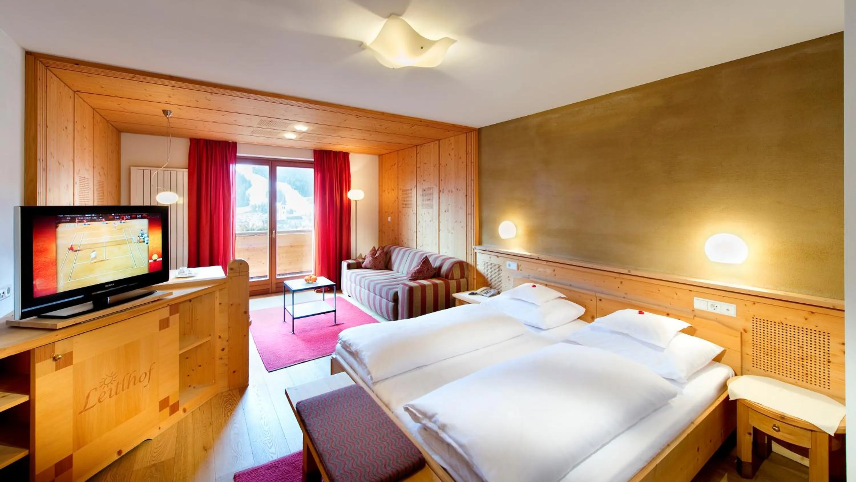 Photo of the whole room, Bed in Naturhotel Leitlhof