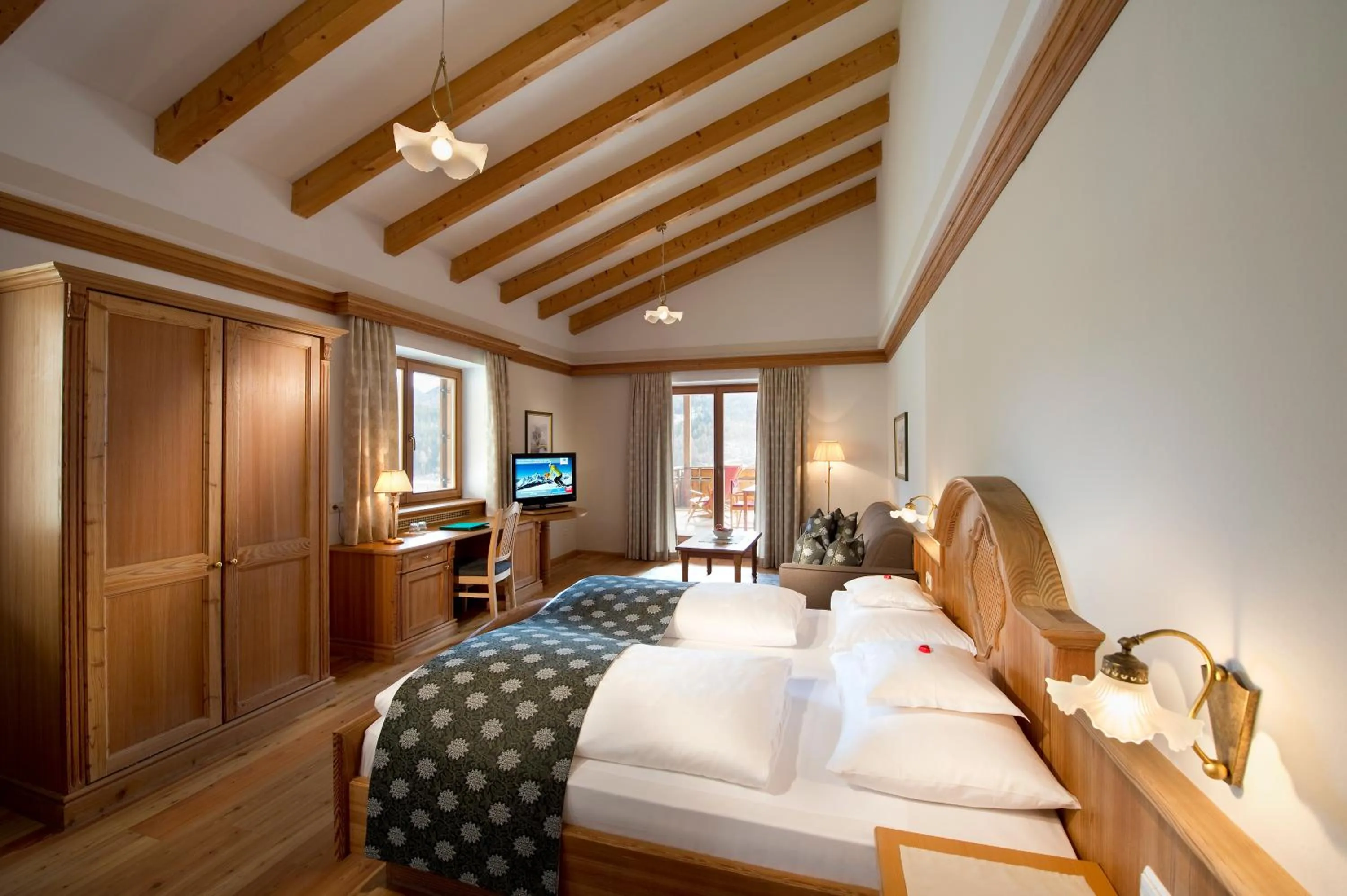 Photo of the whole room, Bed in Naturhotel Leitlhof