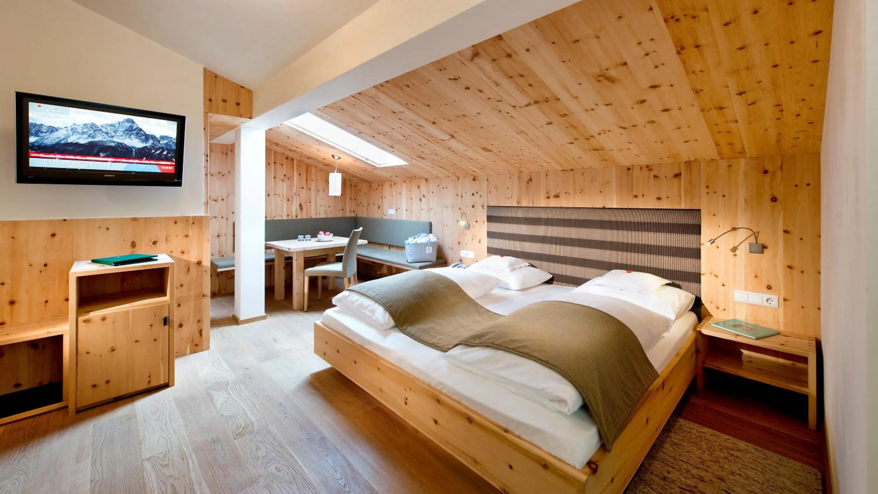 Photo of the whole room, Bed in Naturhotel Leitlhof
