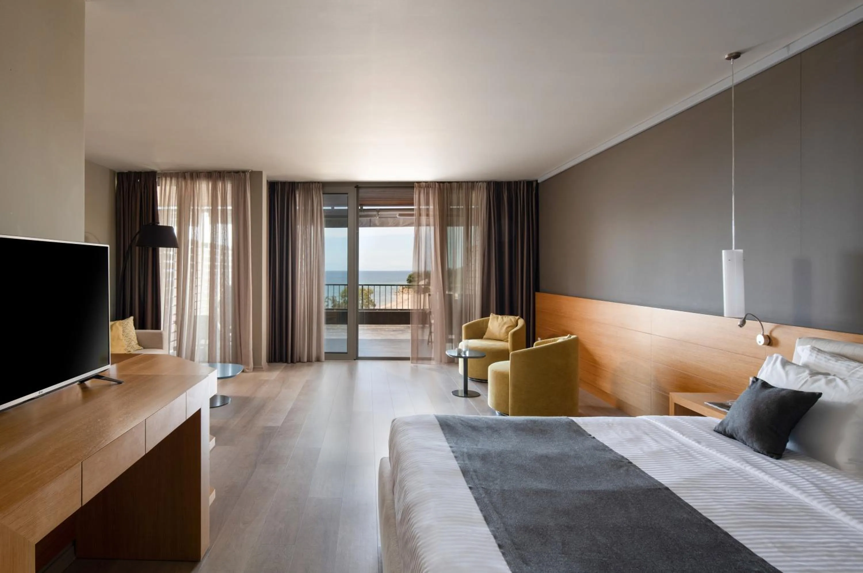 Bed in Blue Dolphin Hotel