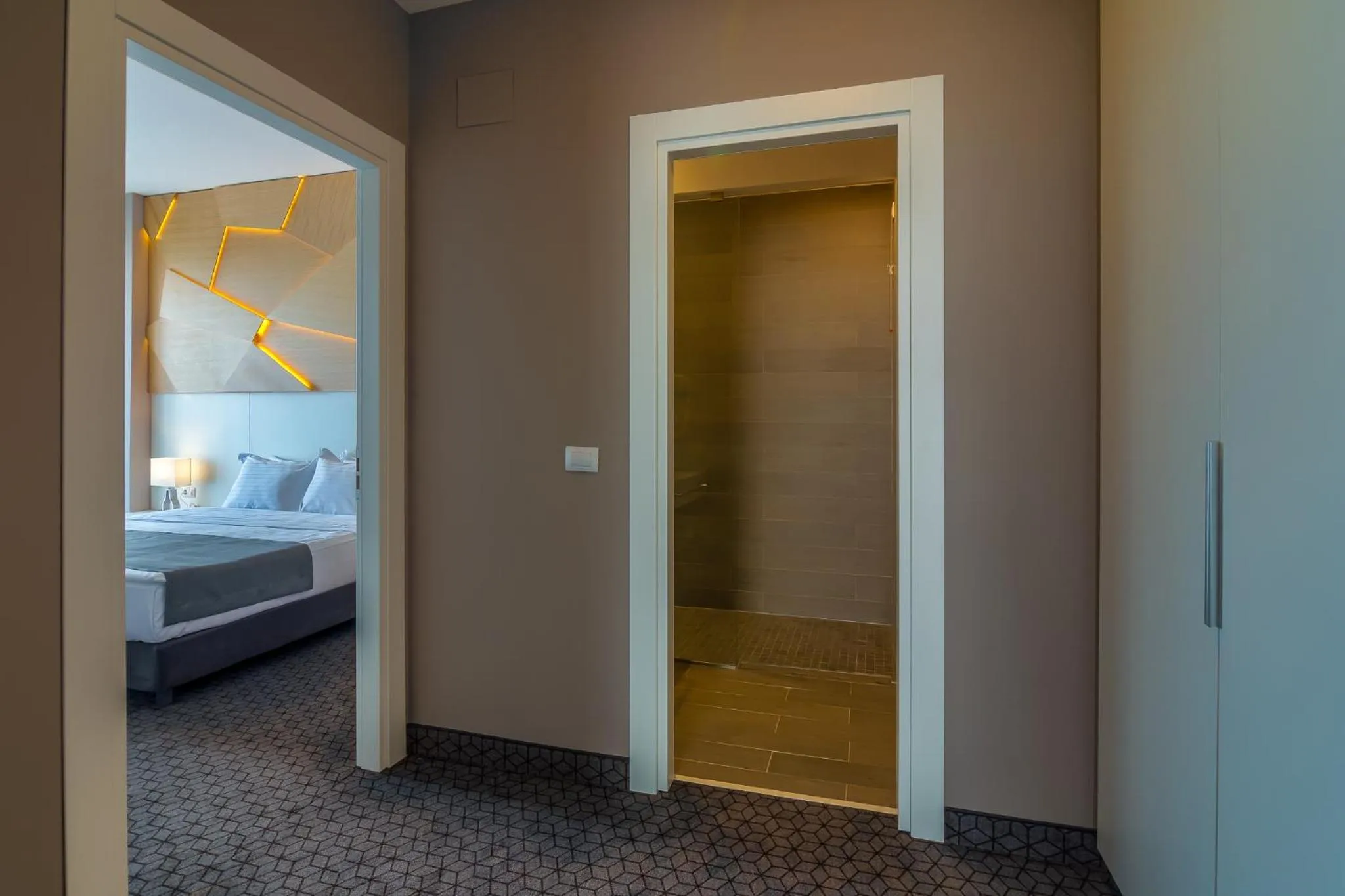 Bed in Nyota Hotel & Conference Center