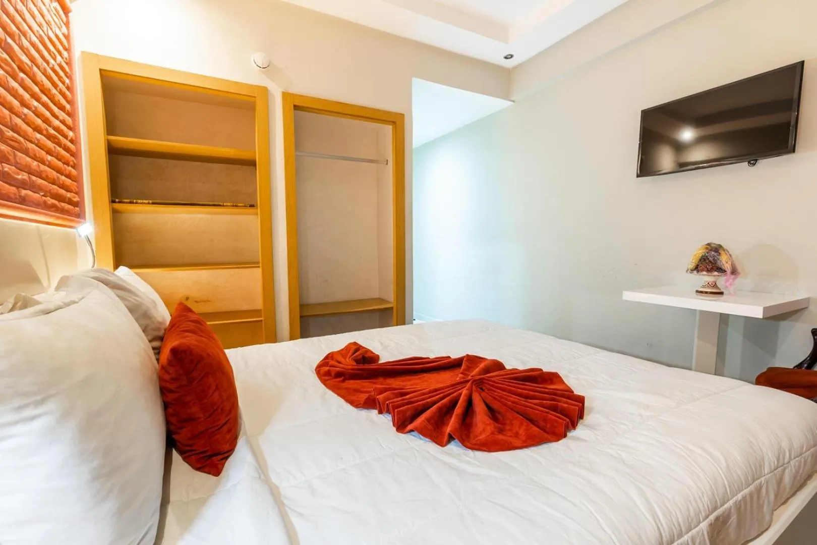 Bedroom in Hotel Hospitality-Inn City Center