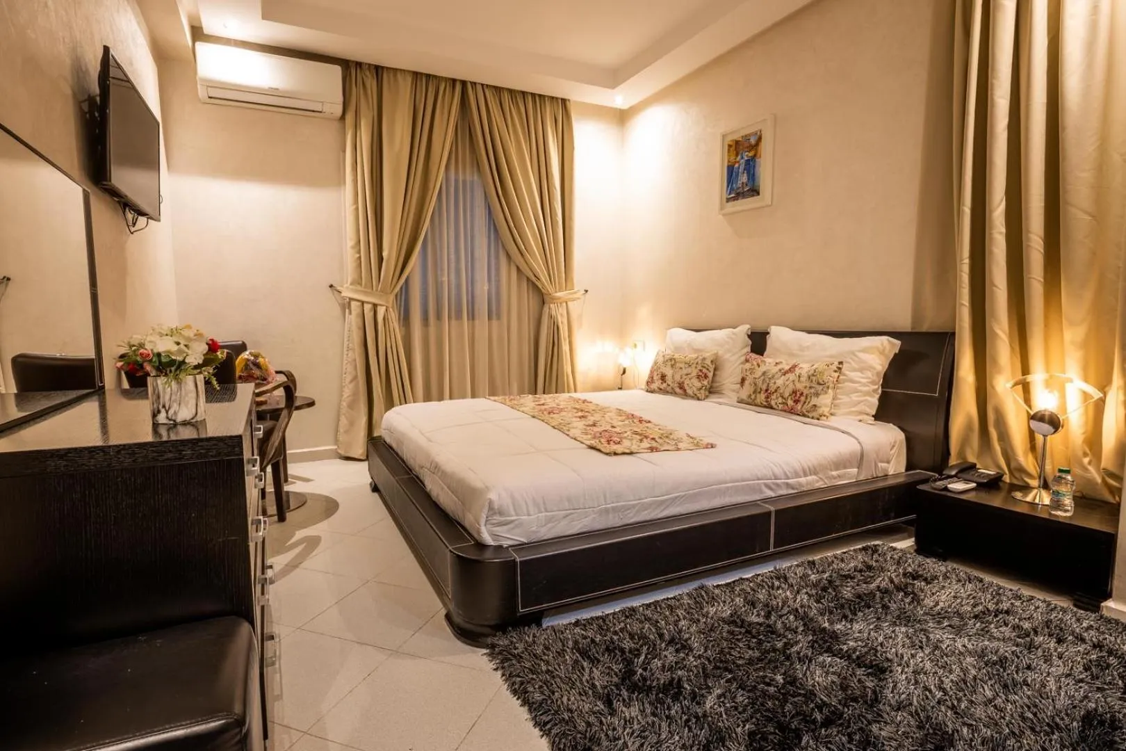 Bedroom in Hotel Hospitality-Inn City Center