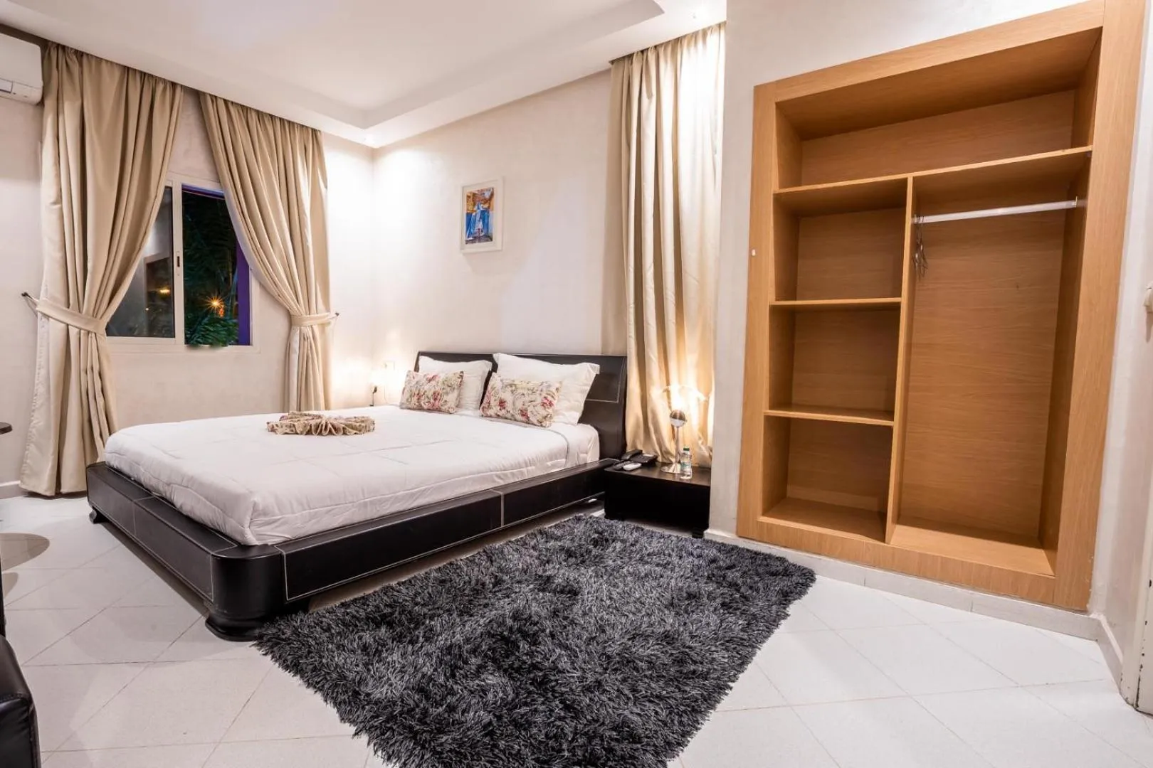 Bedroom in Hotel Hospitality-Inn City Center