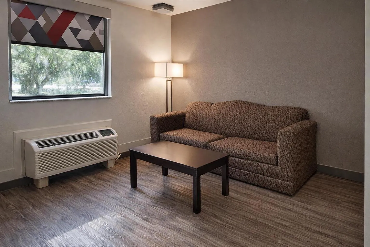 Living room in Motel 6 Lake City, FL – Medical Center