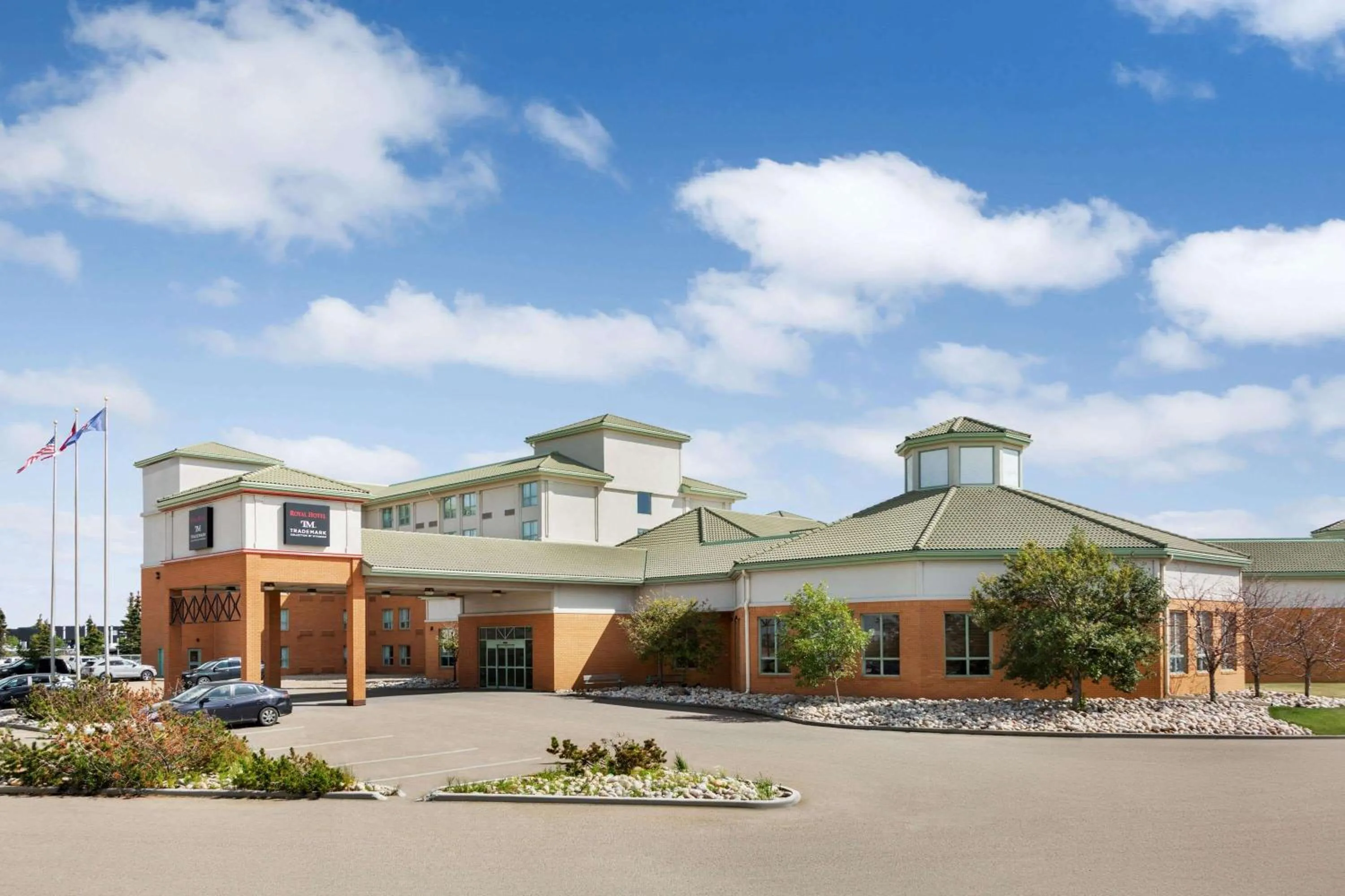 Property building in Royal Hotel Edmonton Airport Trademark Collection By Wyndham