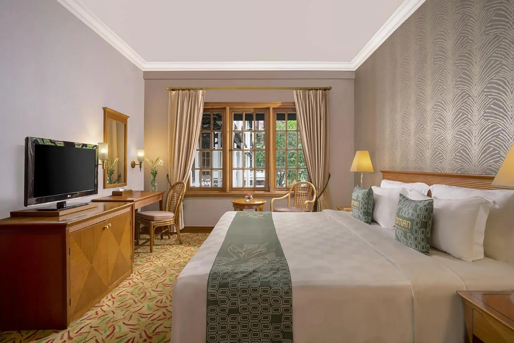 Bed in Loman Park Hotel Yogyakarta