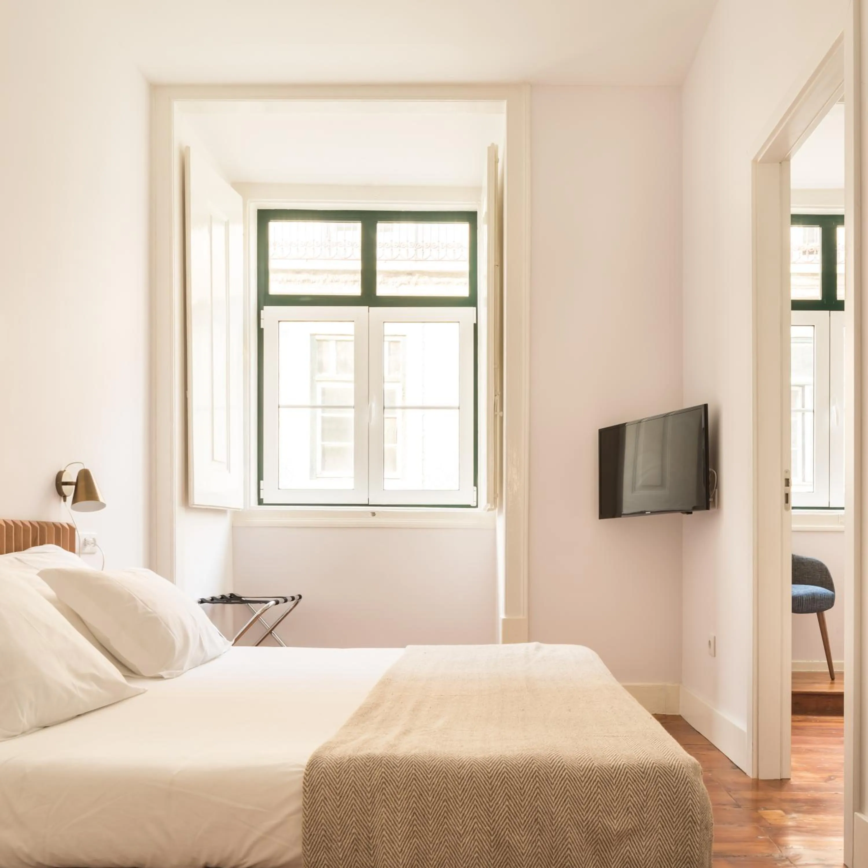 Bed in The Visionaire Apartments