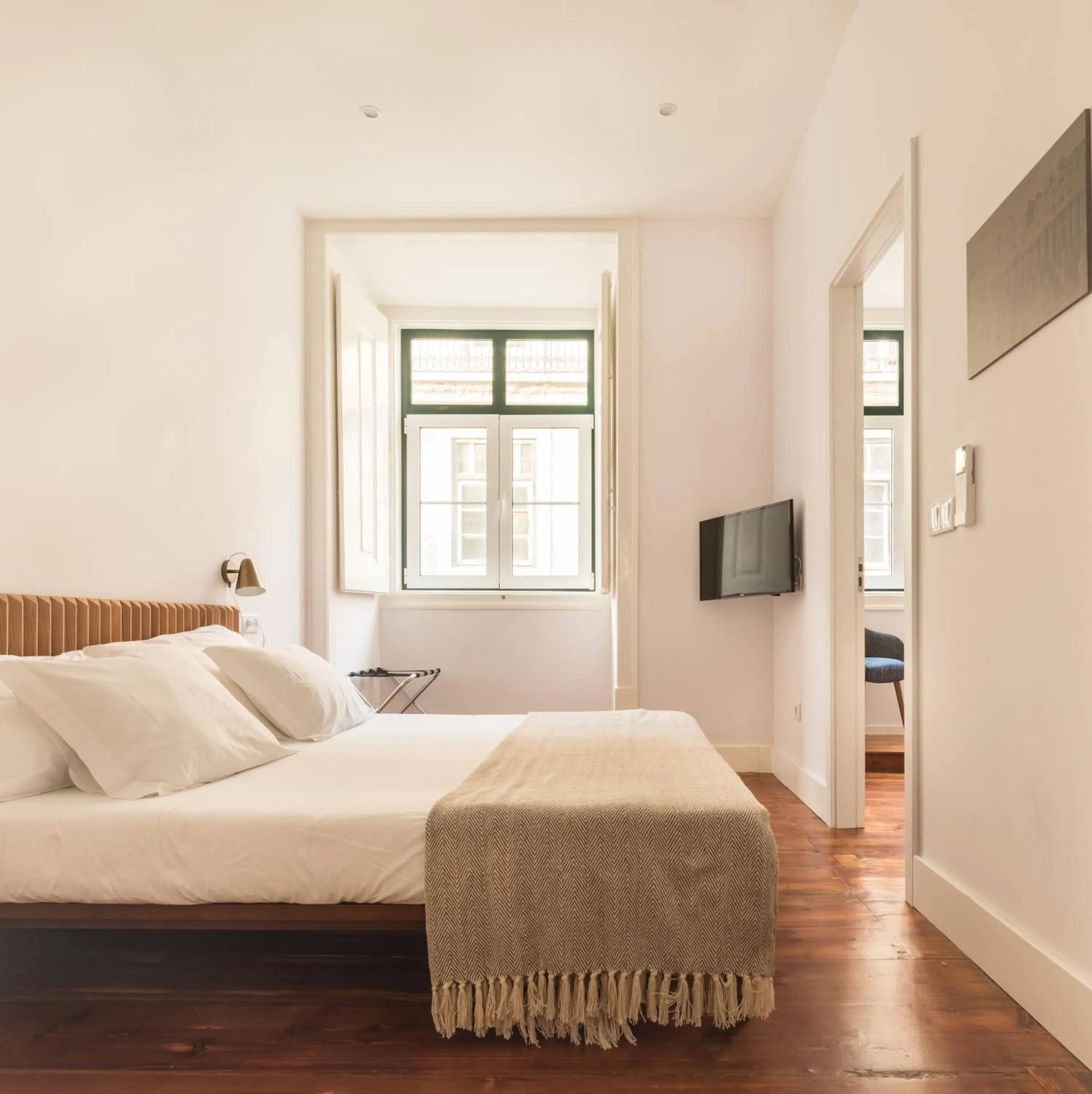 Bed in The Visionaire Apartments