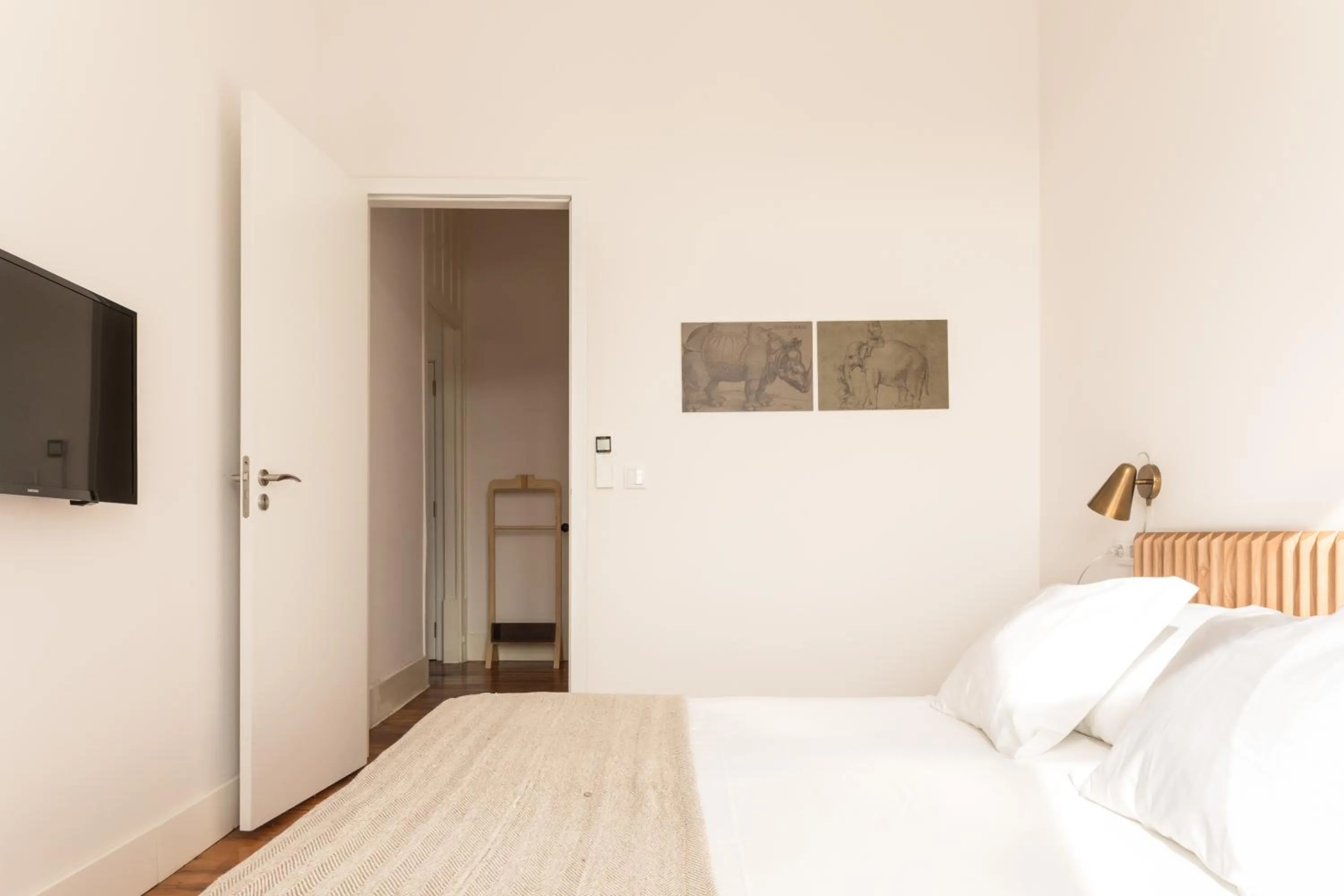 Bed in The Visionaire Apartments