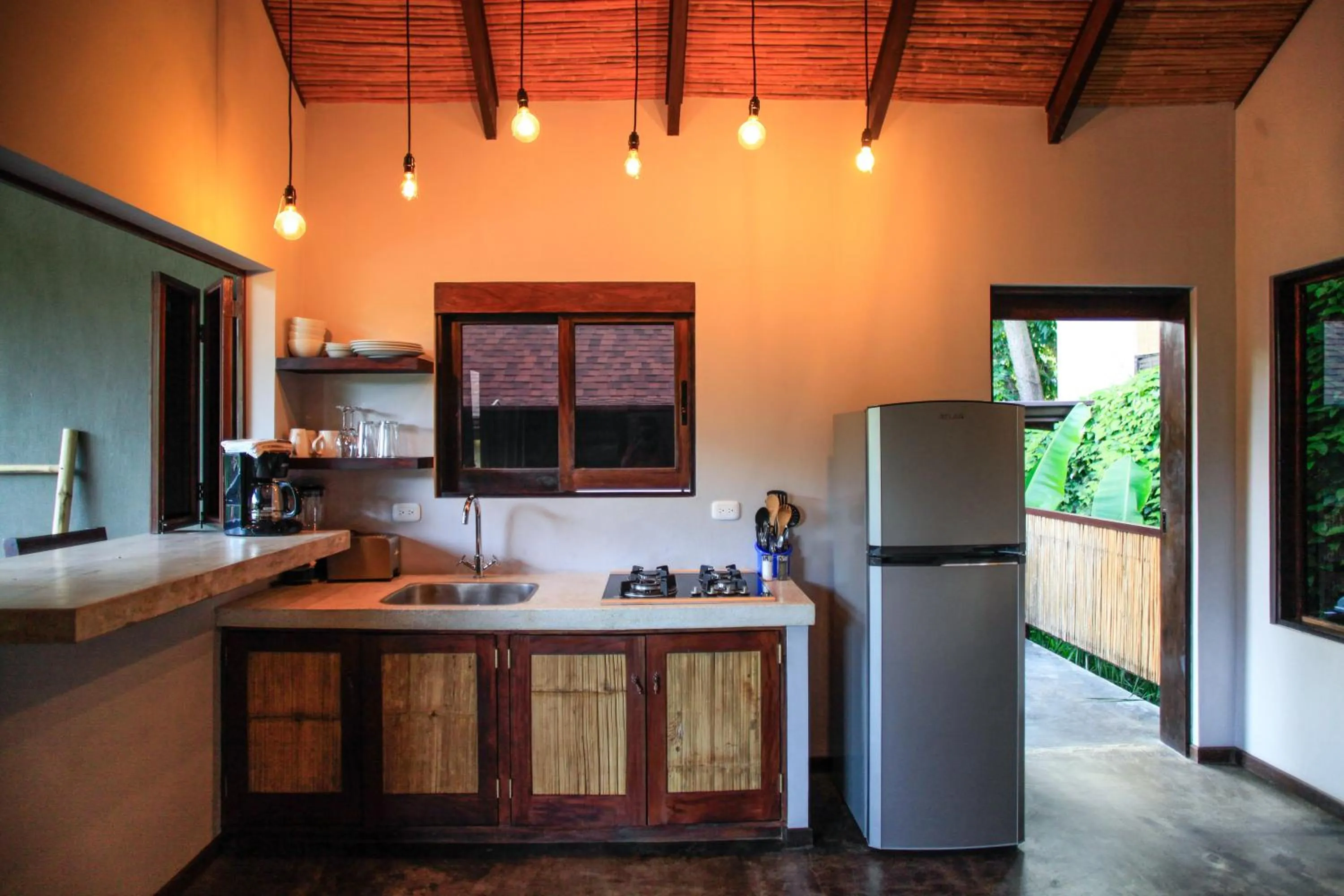 Kitchen or kitchenette in Lua Villas