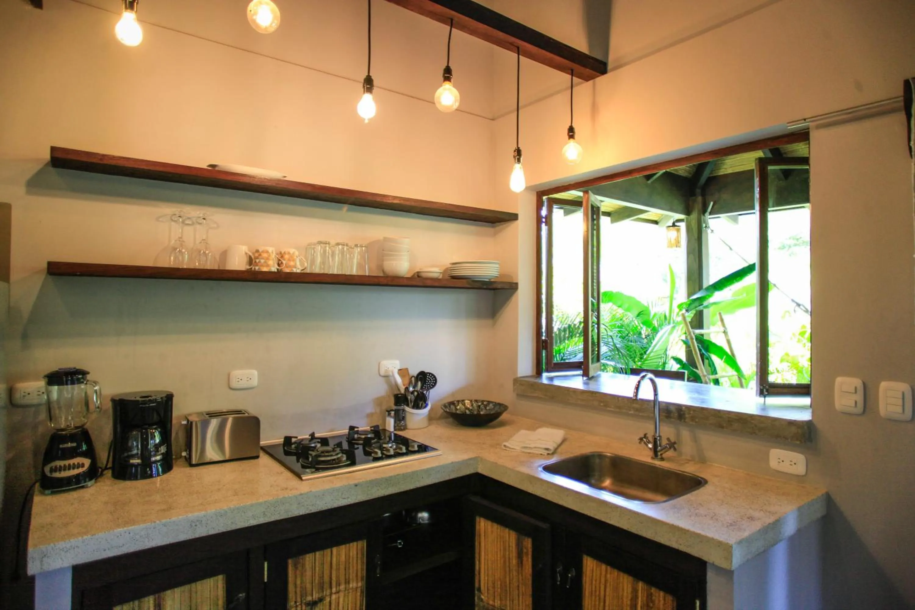 Kitchen or kitchenette in Lua Villas