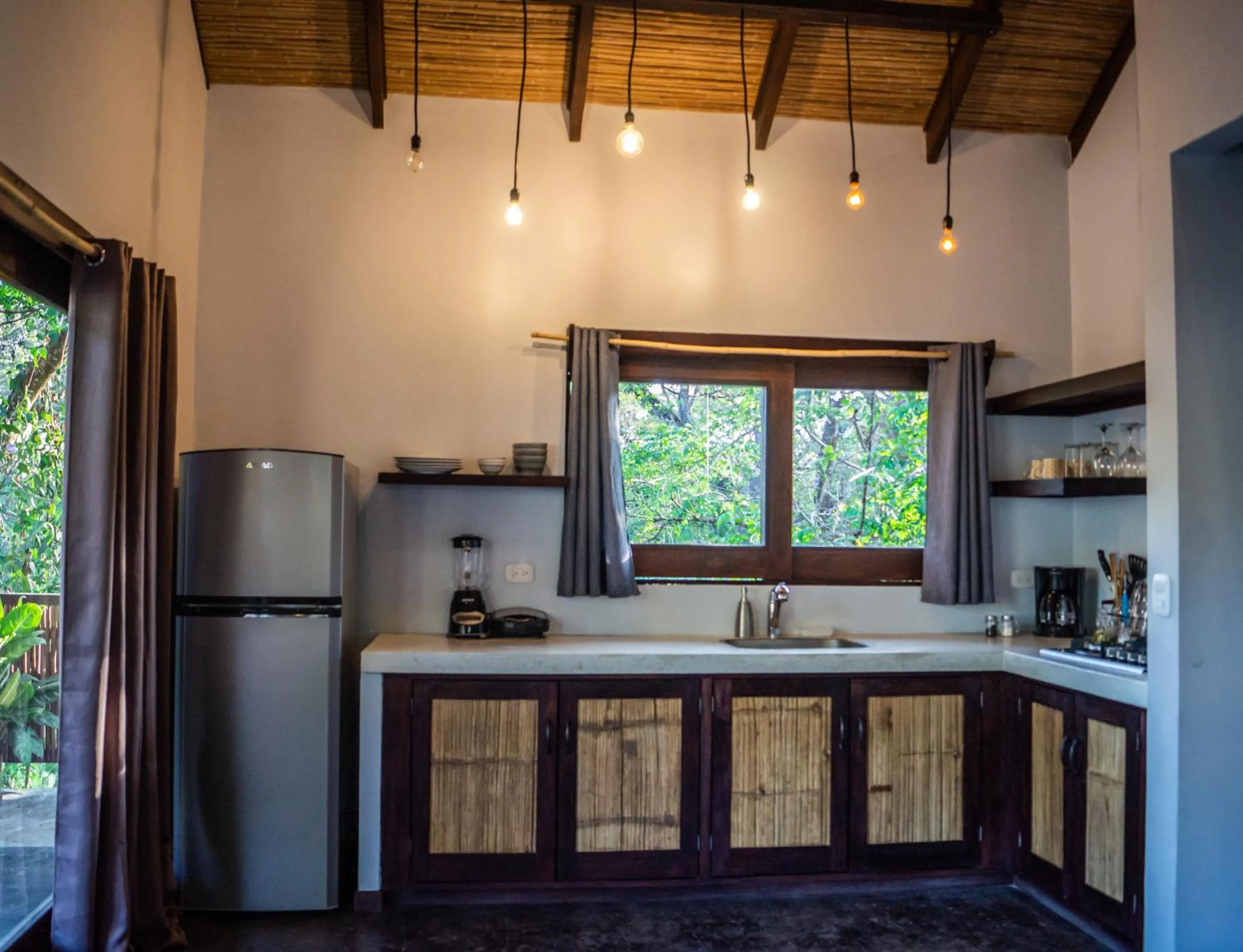 Kitchen or kitchenette in Lua Villas