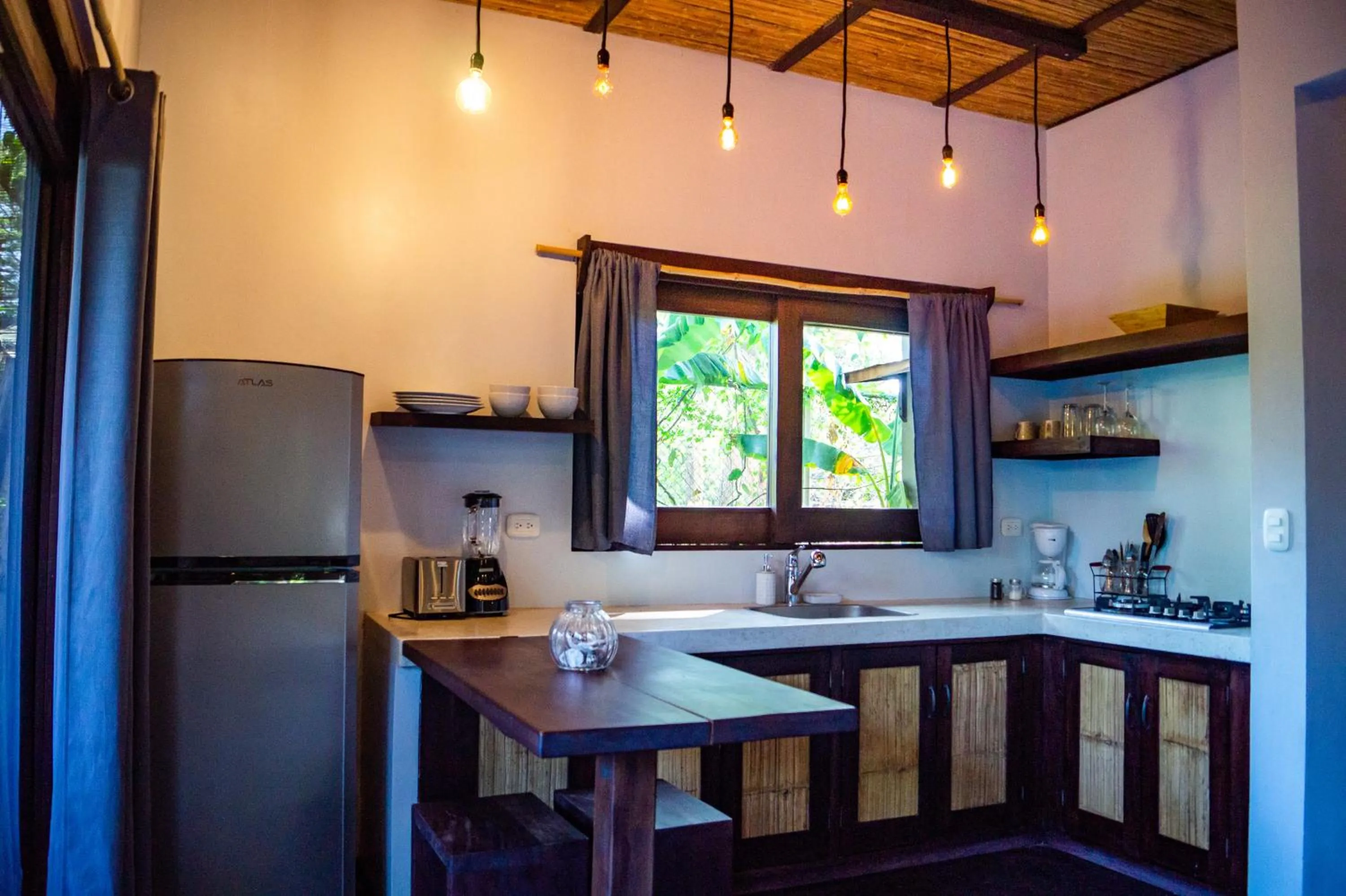 Kitchen or kitchenette in Lua Villas