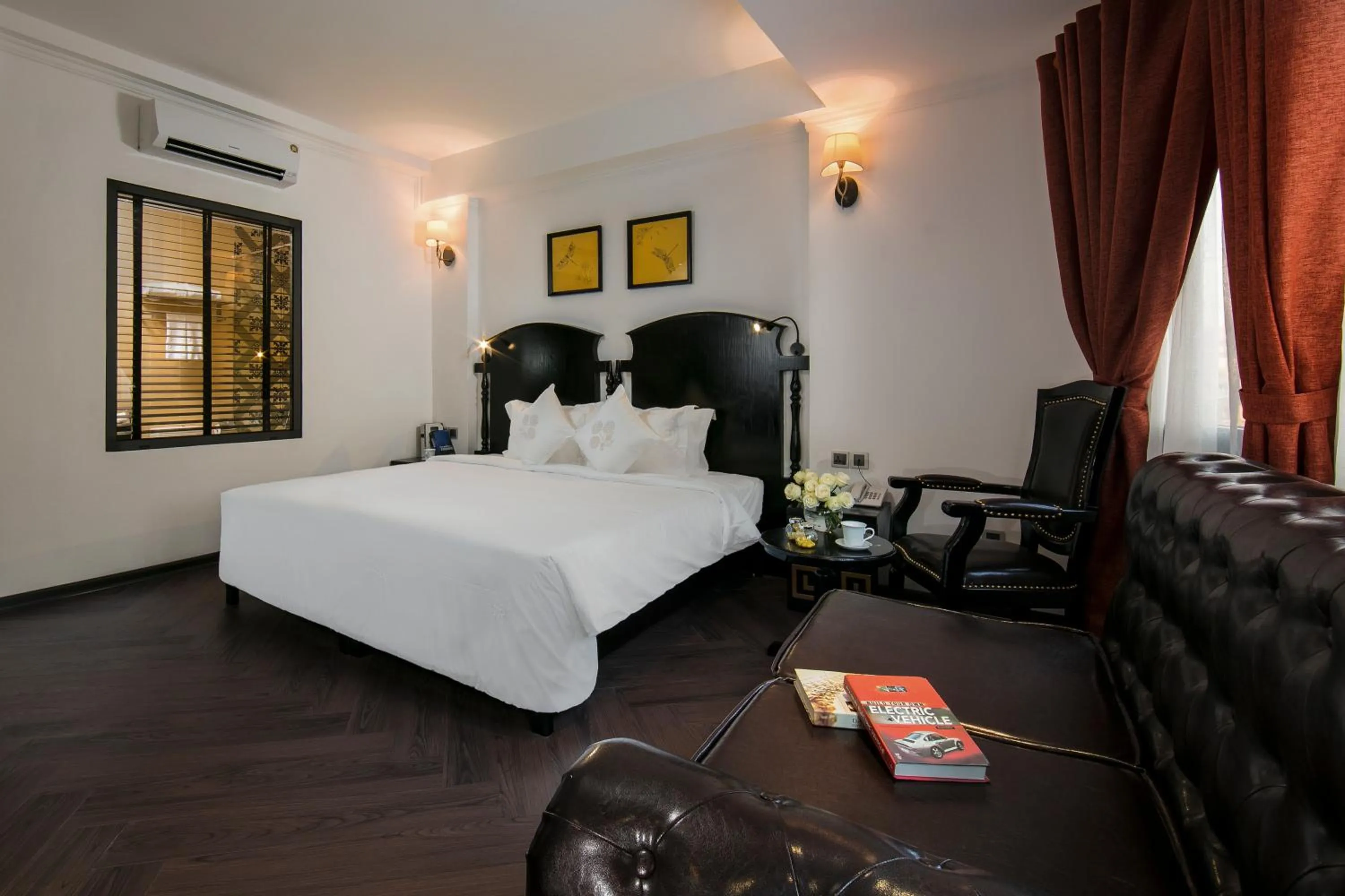 Seating area, Bed in Hanoi Center Silk Premium Hotel & Spa & Travel