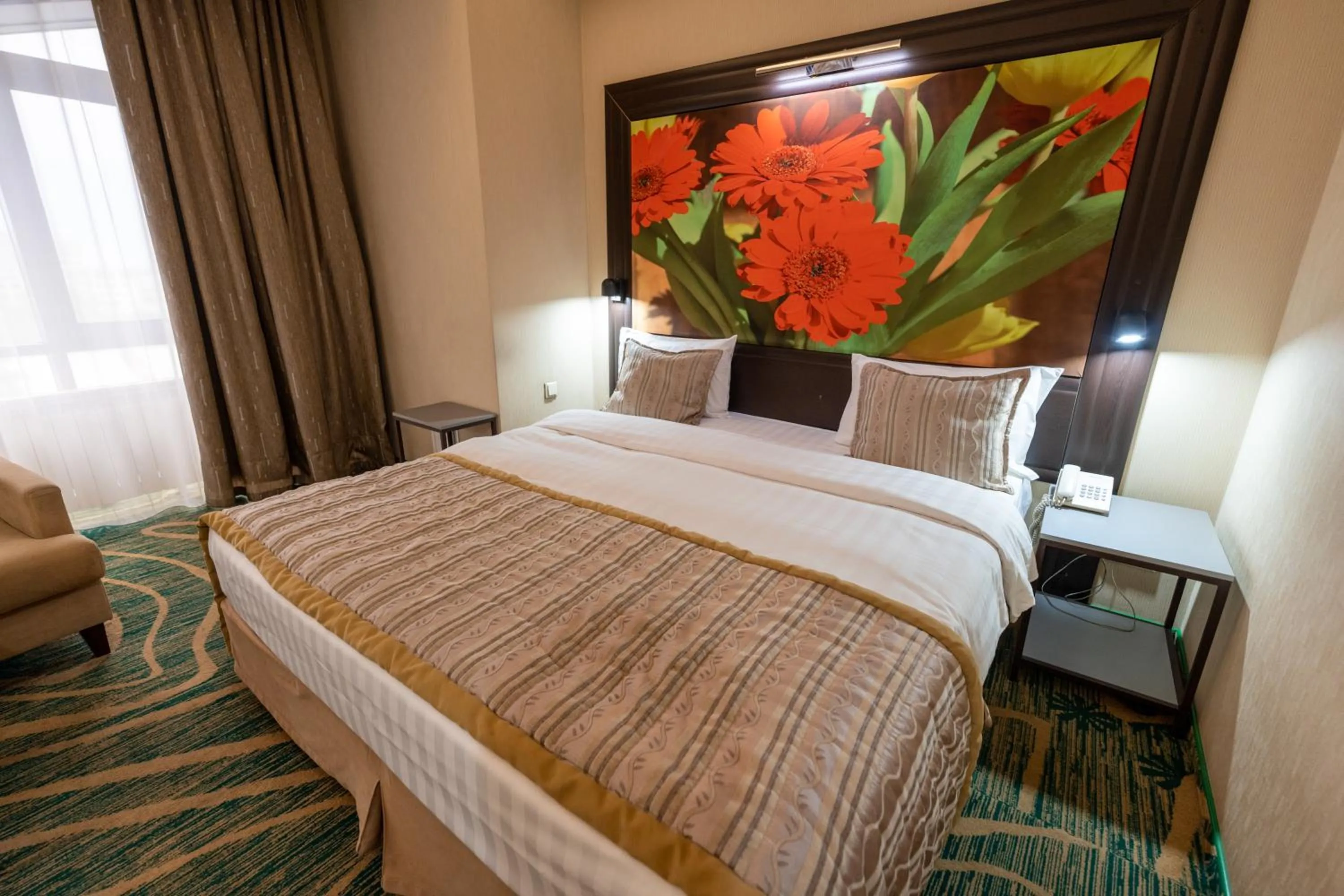 Bed in Hotel Kazzhol Almaty