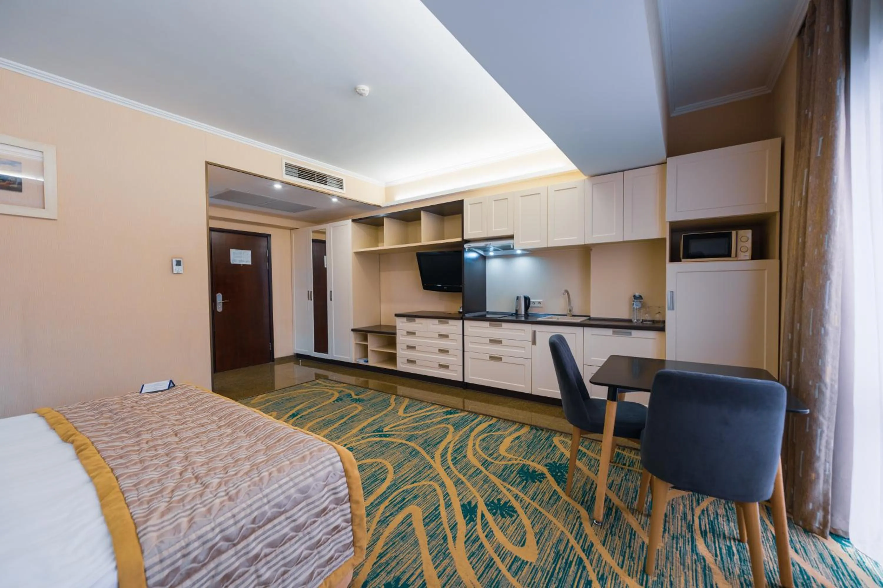 Bed in Hotel Kazzhol Almaty