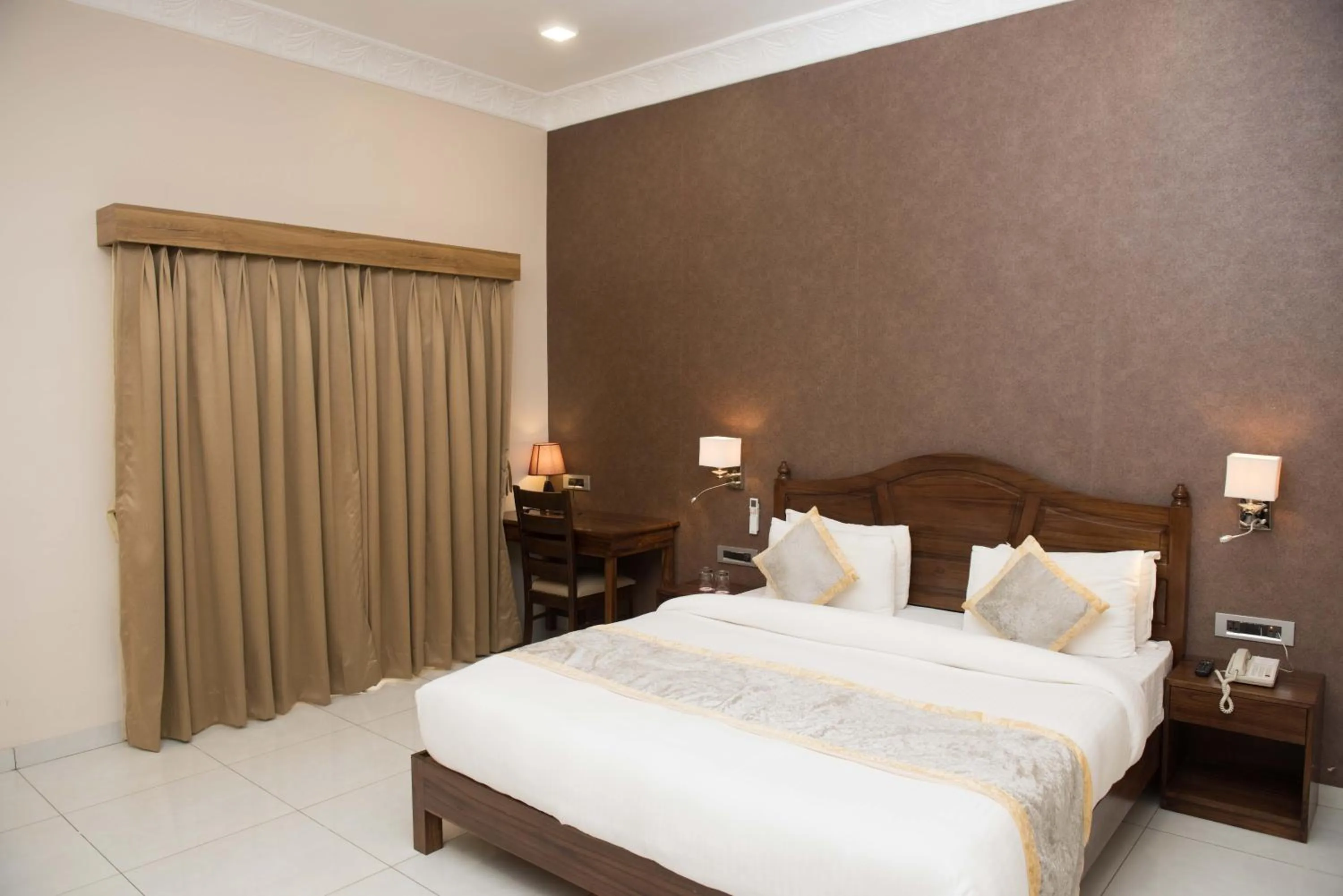 Bed in Sun Hotel and Resort, Mount Abu