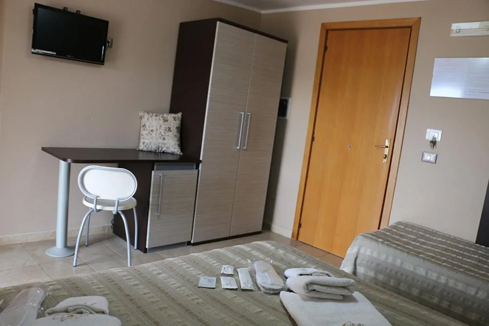 Communal lounge/ TV room in B&B Gattopardo