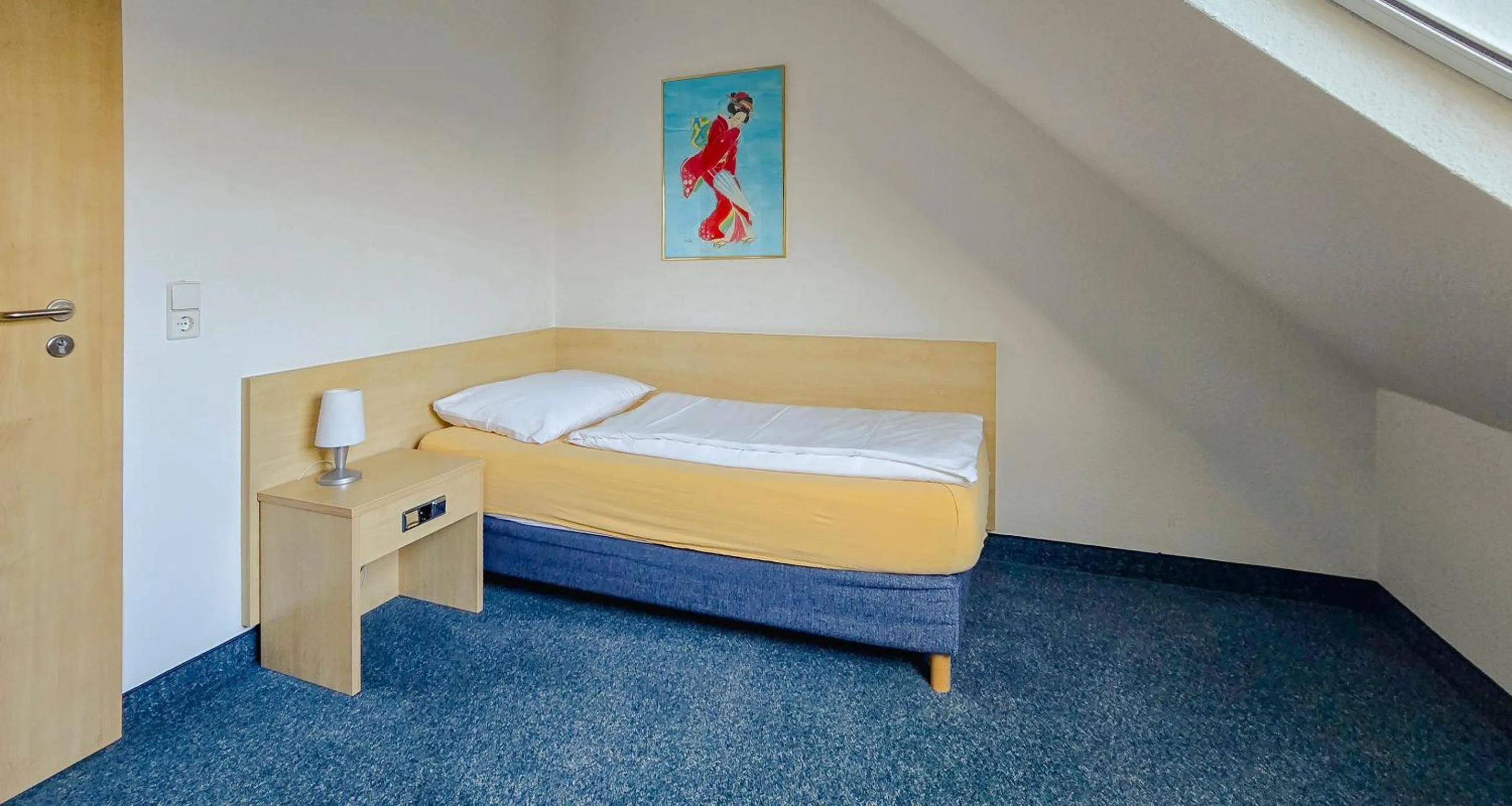 Bed in Fairway Hotel