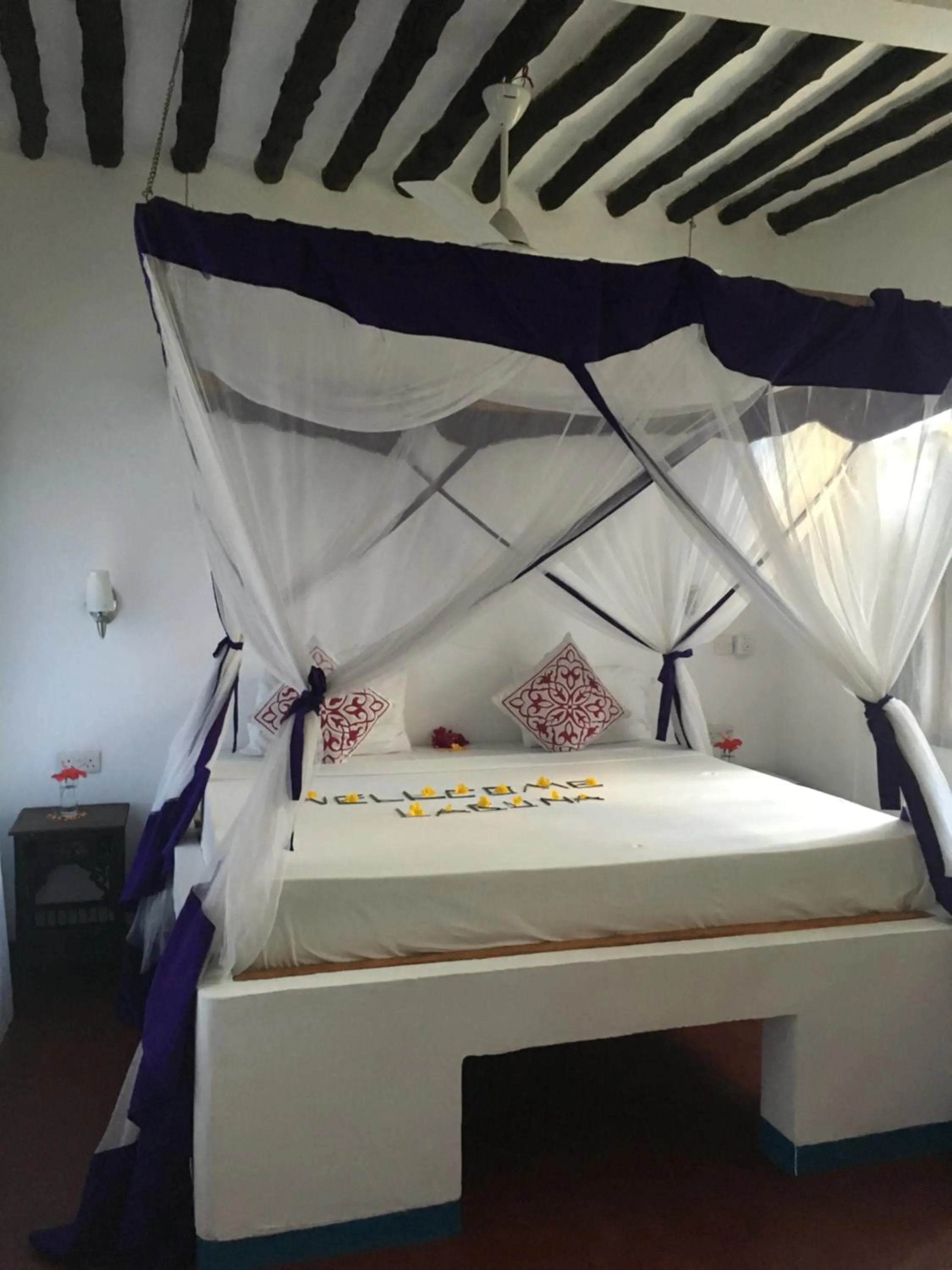 Bed in Laguna Palace Zanzibar